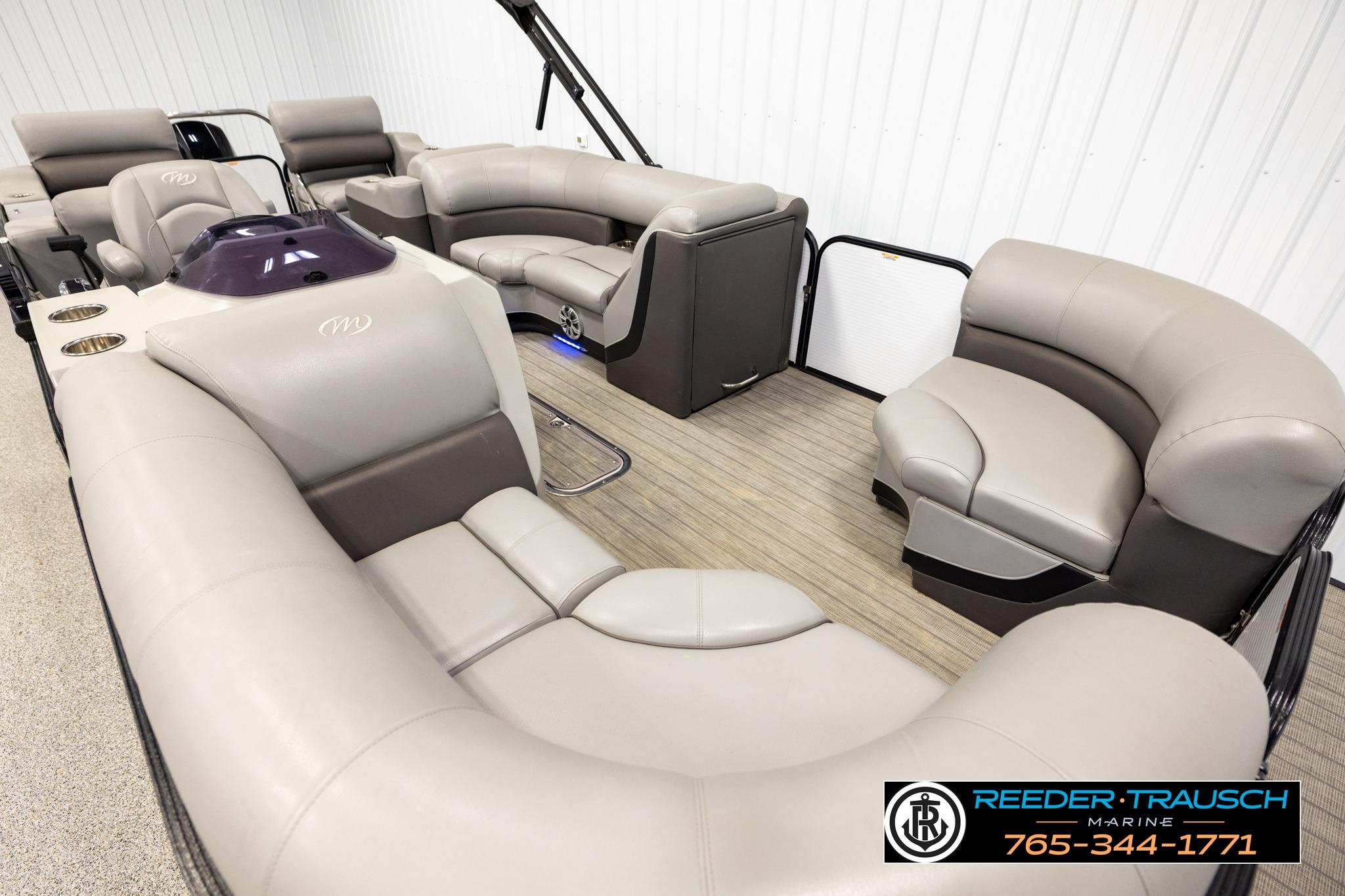 2019 Manitou Oasis SR VP pontoon boat interior with luxurious seating and modern design.
