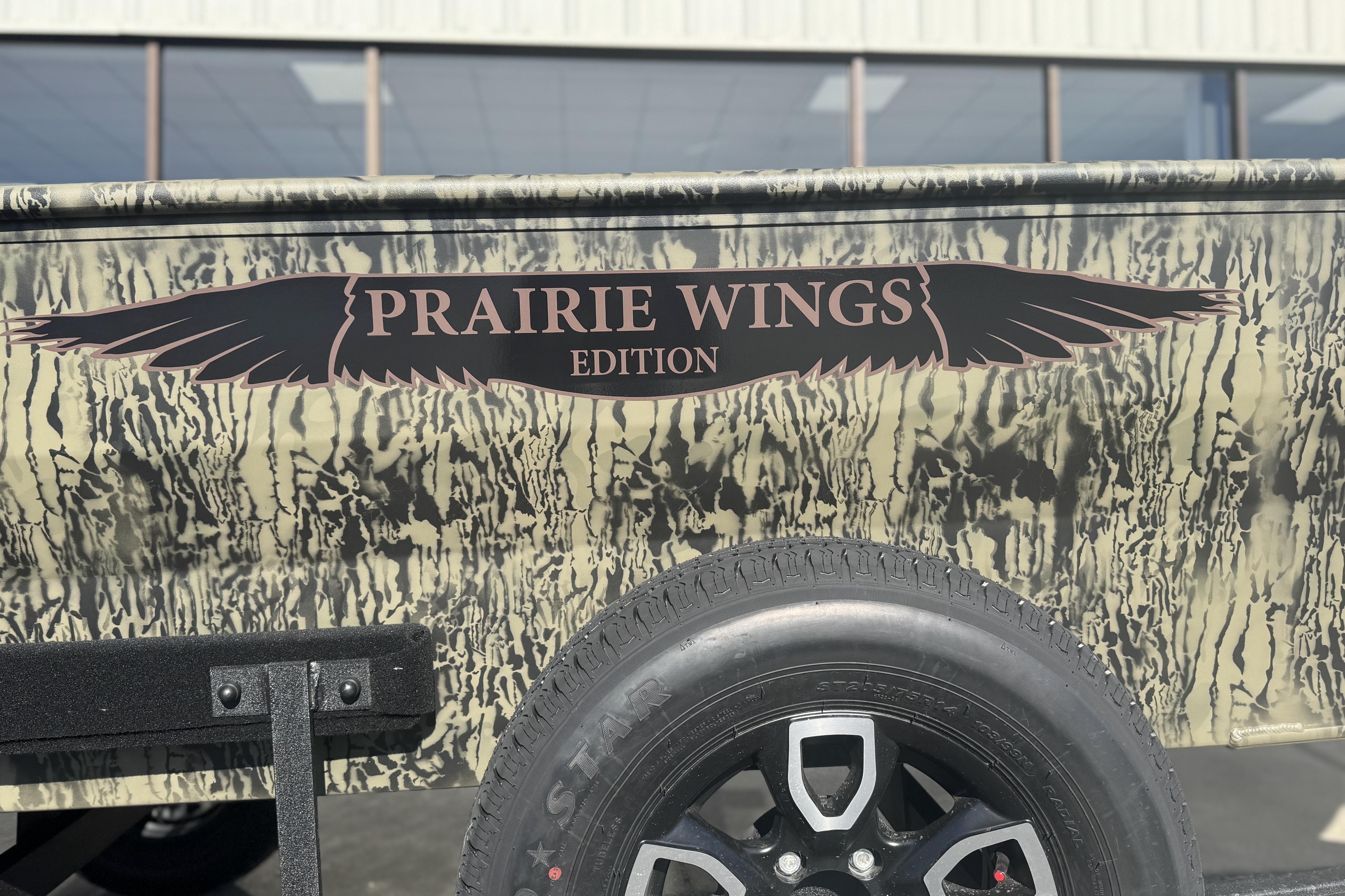 2026 Tracker Grizzly 1650 T Prairie Wings Edition with camouflage design and black wheel.