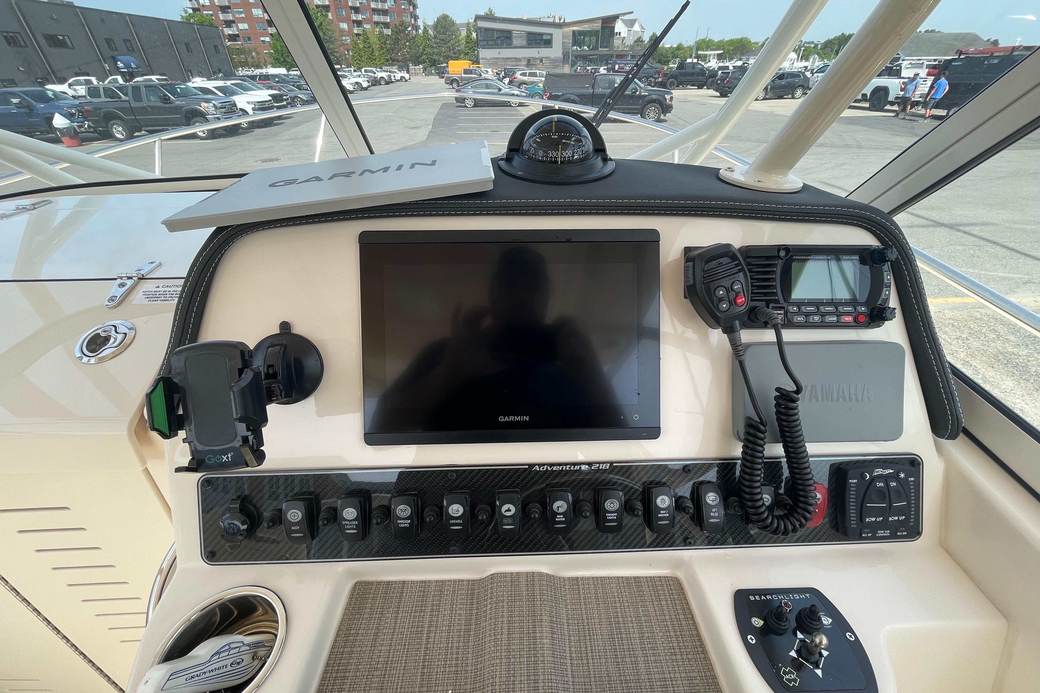2024 Grady-White Adventure 218 helm with Garmin navigation and control panel.