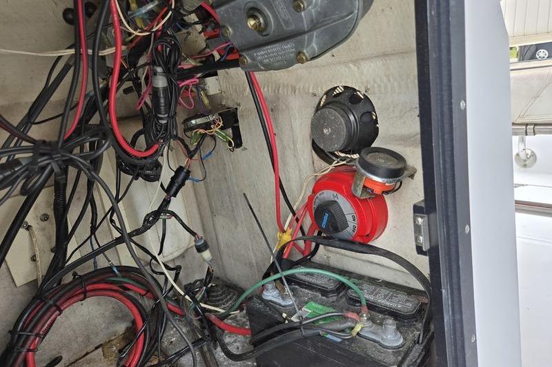 Electrical wiring and components inside a 1996 Boston Whaler Outrage 17 boat.