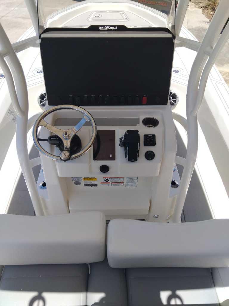2025 Mako 24 APEX boat console with steering wheel and controls.