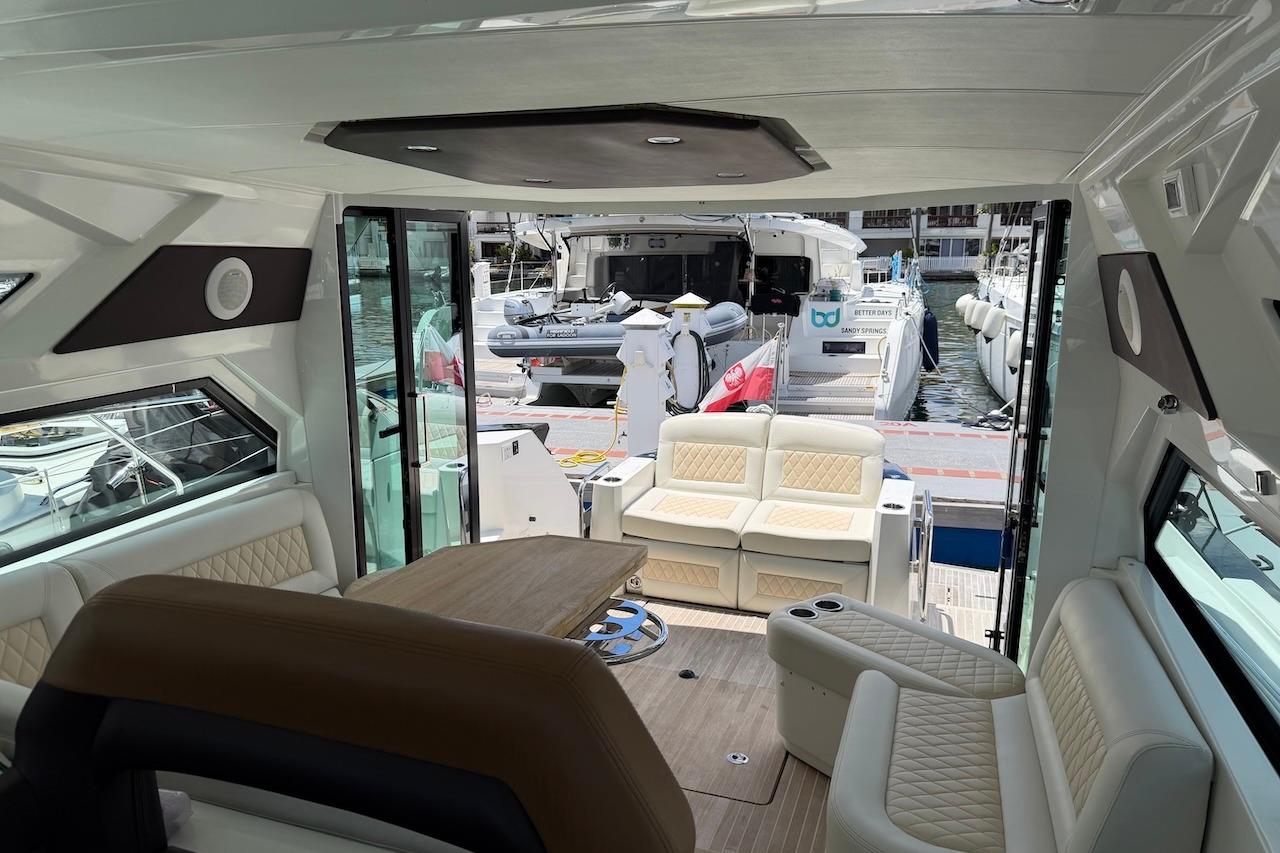Interior view of 2018 Beneteau Gran Turismo 46 yacht, featuring luxurious seating and modern design.