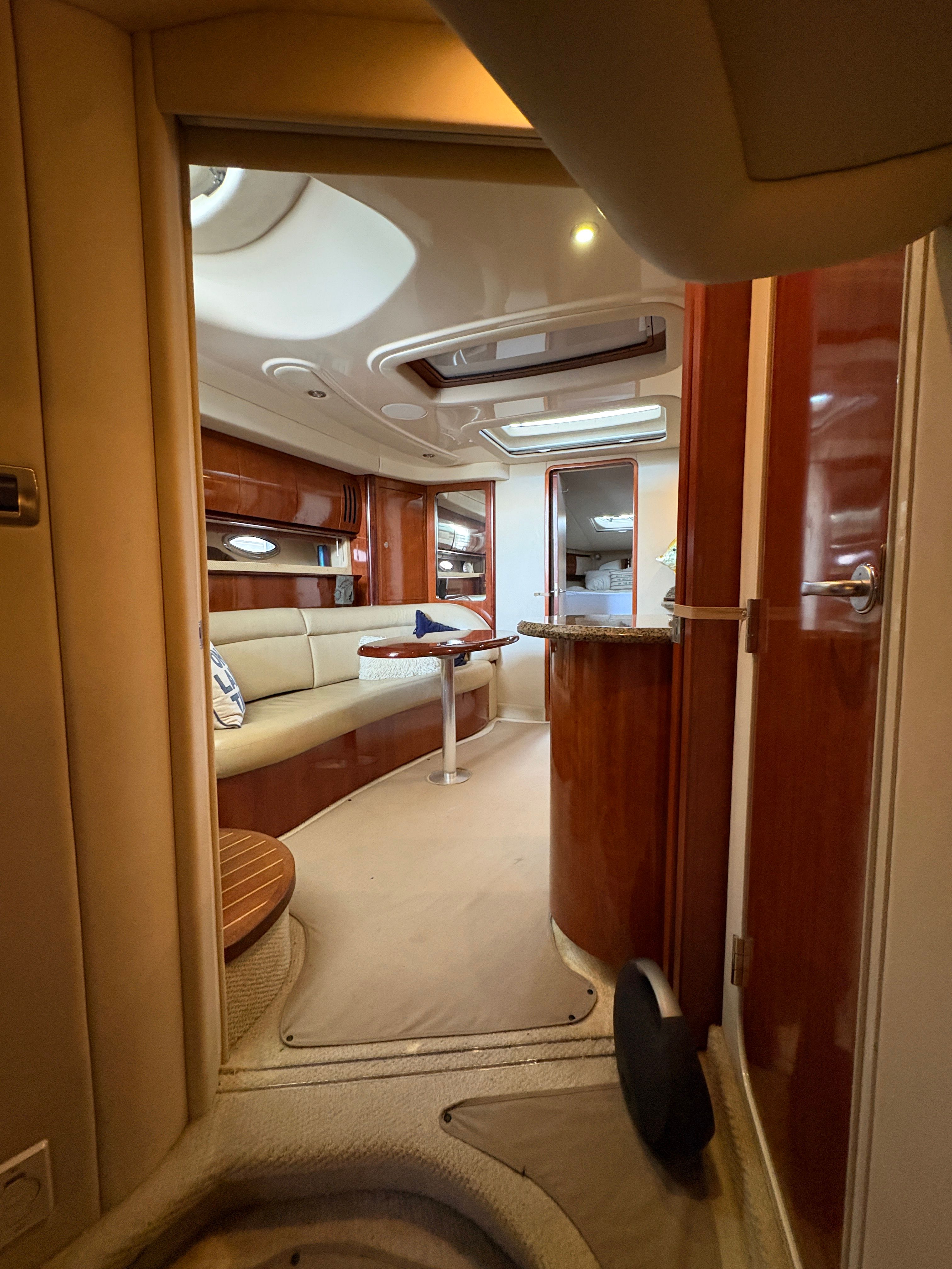 Interior of a 2005 Sea Ray 420 Sundancer yacht, luxurious and elegant.