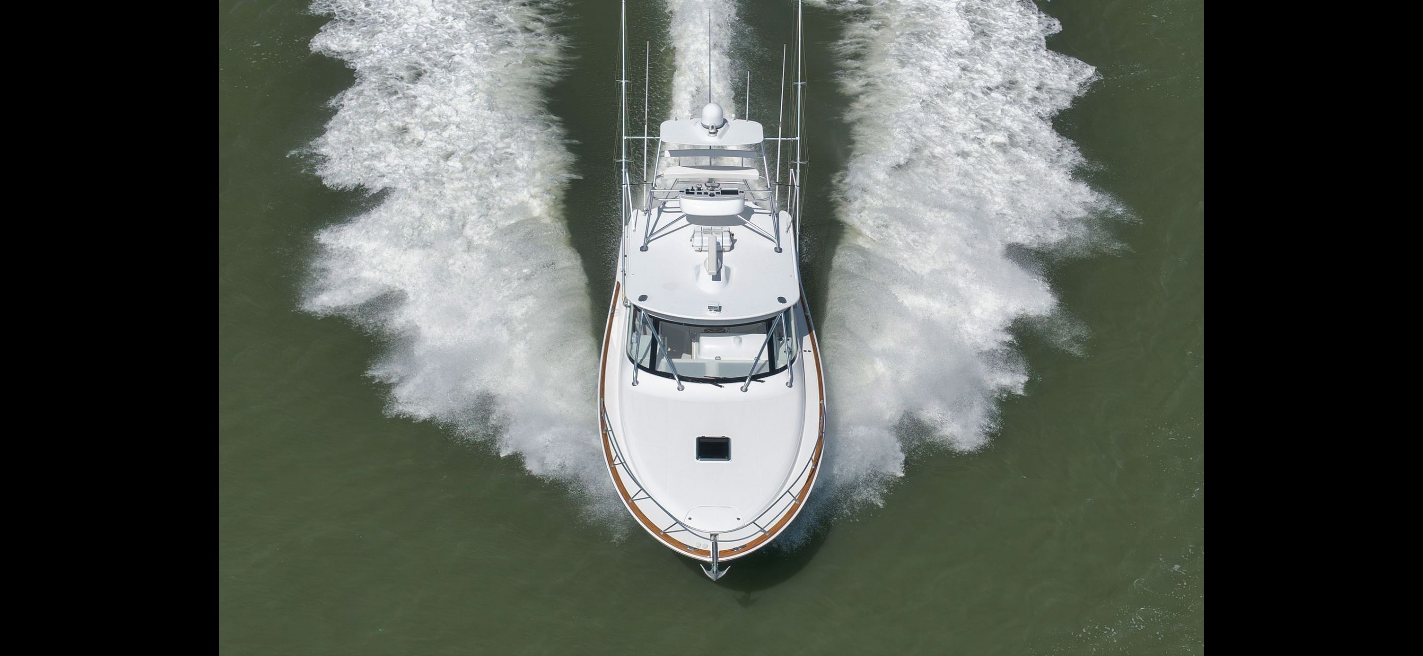 Mag Bay 42 Express 2022 on water, aerial view.