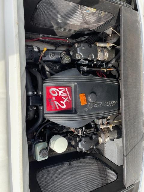 Engine compartment of a 2002 VIP 2400 Vindicator with Mercury MX 6.2 motor.