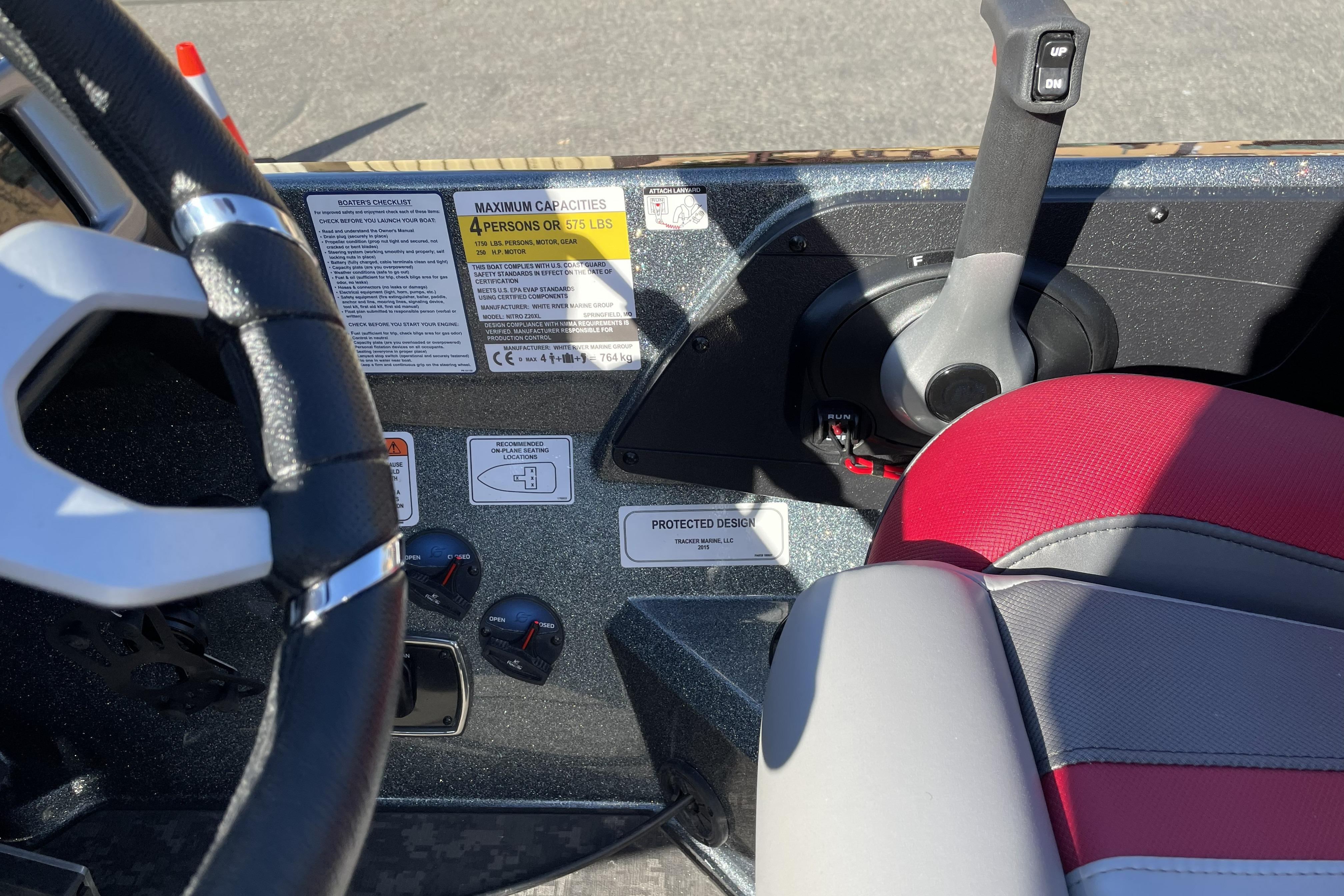 Steering wheel and controls of 2026 Nitro Z20 XL boat cockpit.