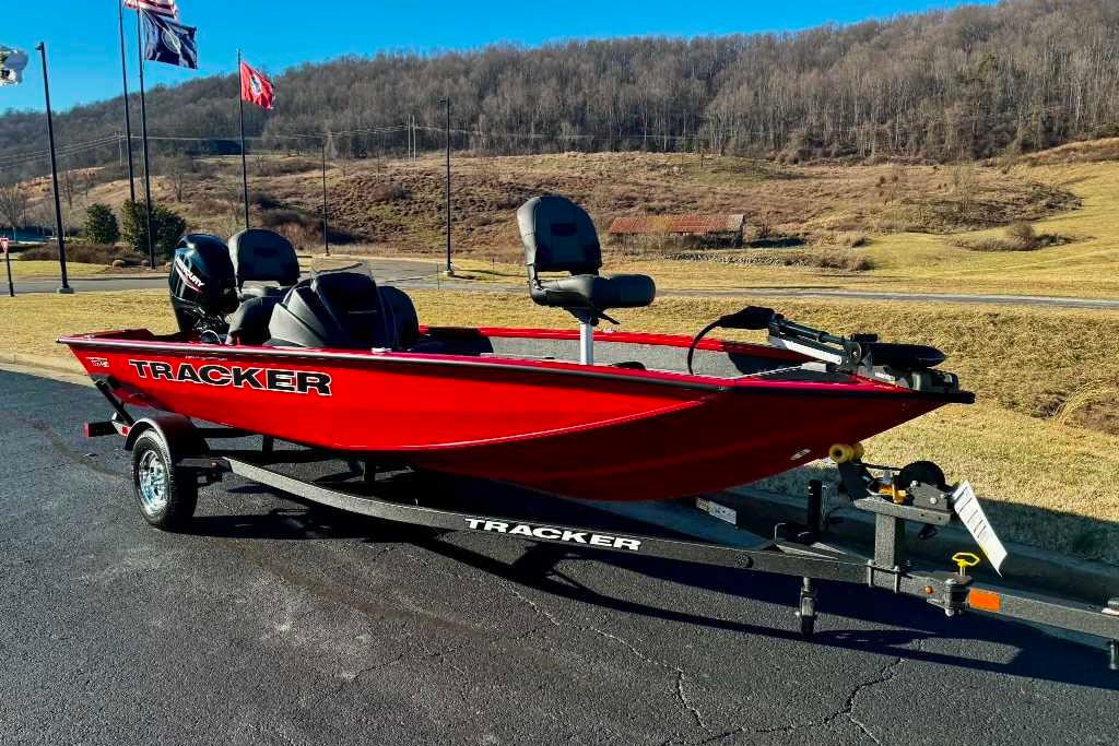 2026 Tracker Pro Team 175 Crappie Edition boat on trailer, scenic background.