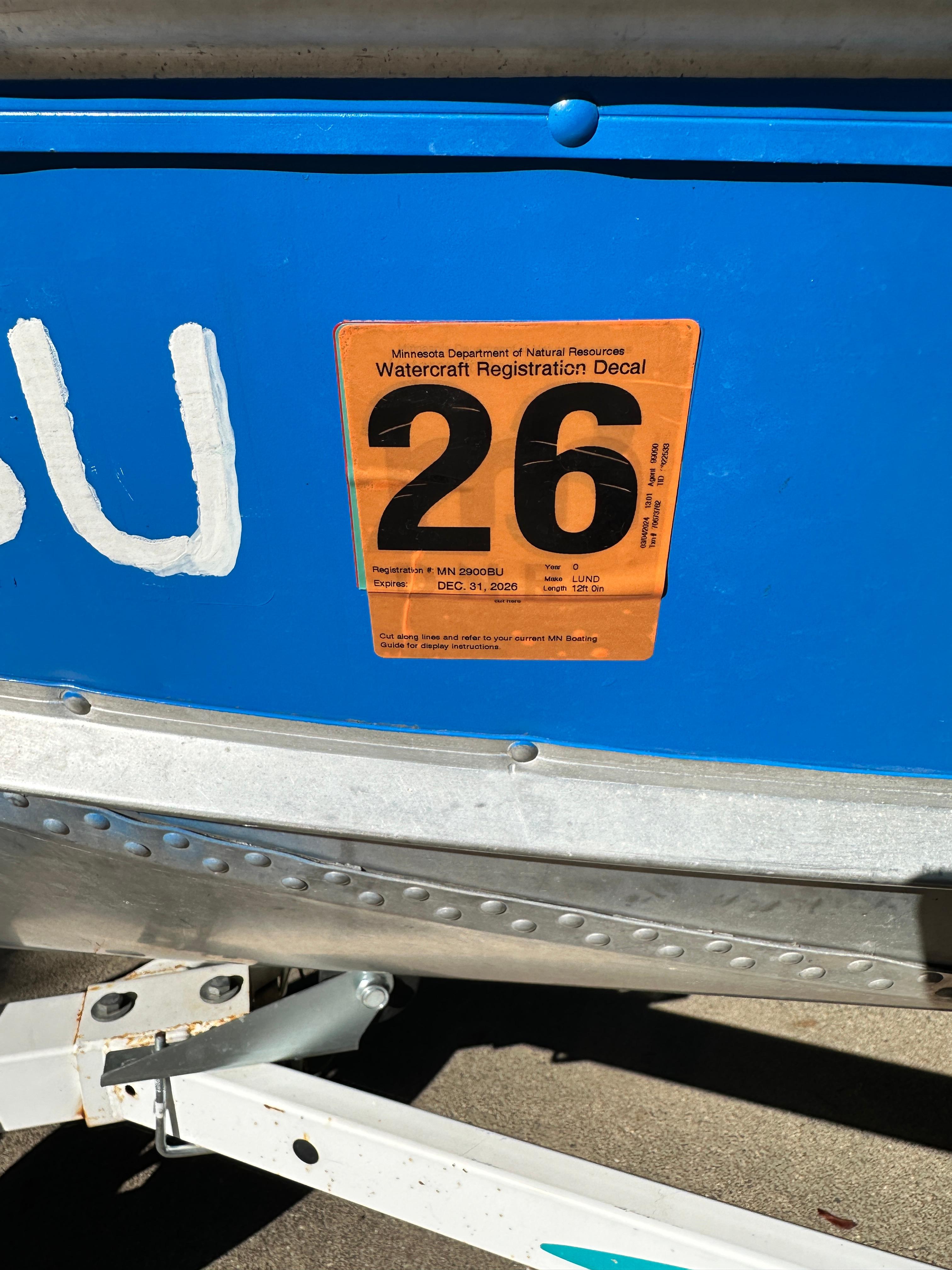 1960 Lund H boat with Minnesota watercraft registration decal.