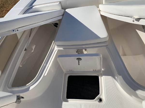 2024 Robalo 226 Cayman boat interior storage compartments and seating.