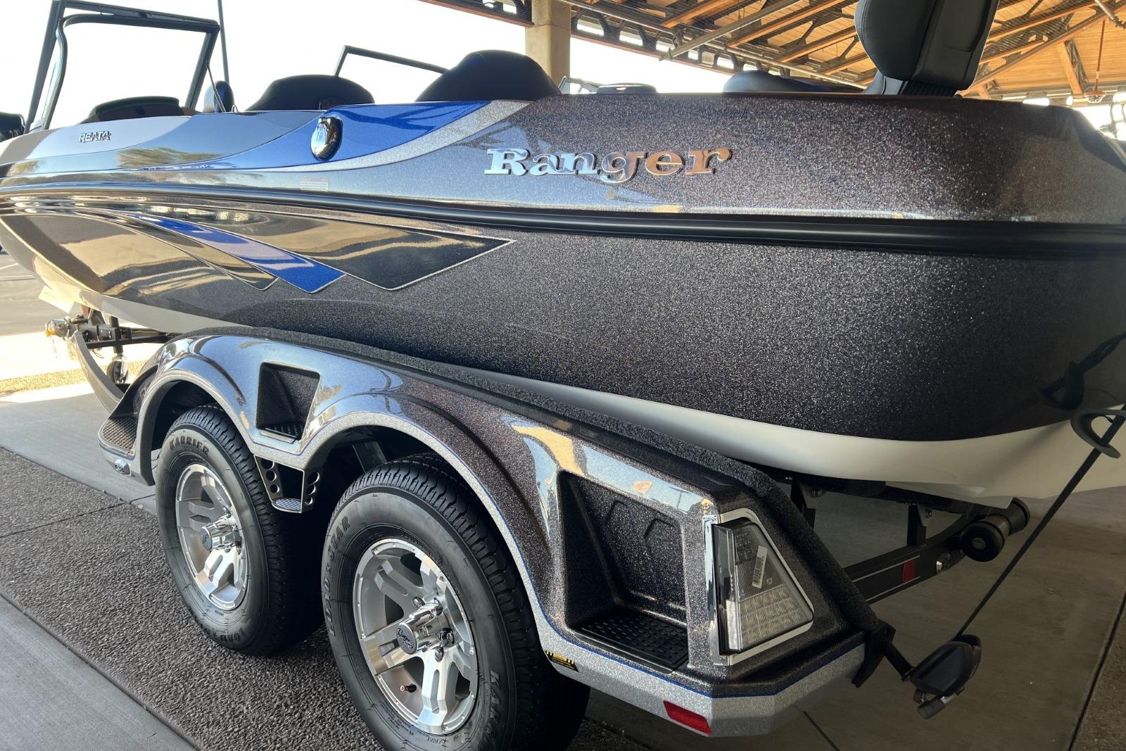 2025 Ranger 212LS boat on trailer, featuring sleek design and metallic finish.
