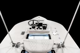 2026 Contender 28 Tournament boat dashboard with steering wheel and controls.