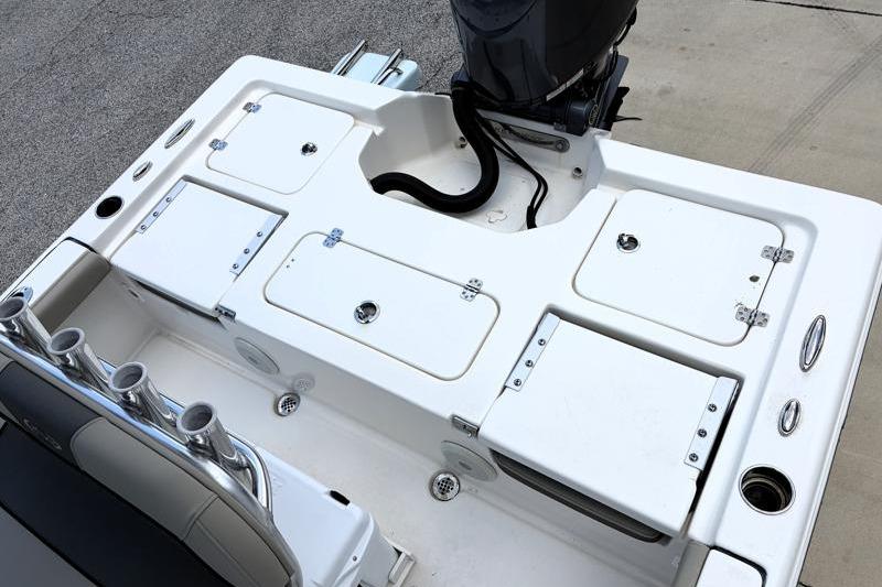 2025 Key West 210 Bay Reef boat deck with storage compartments and motor mount.