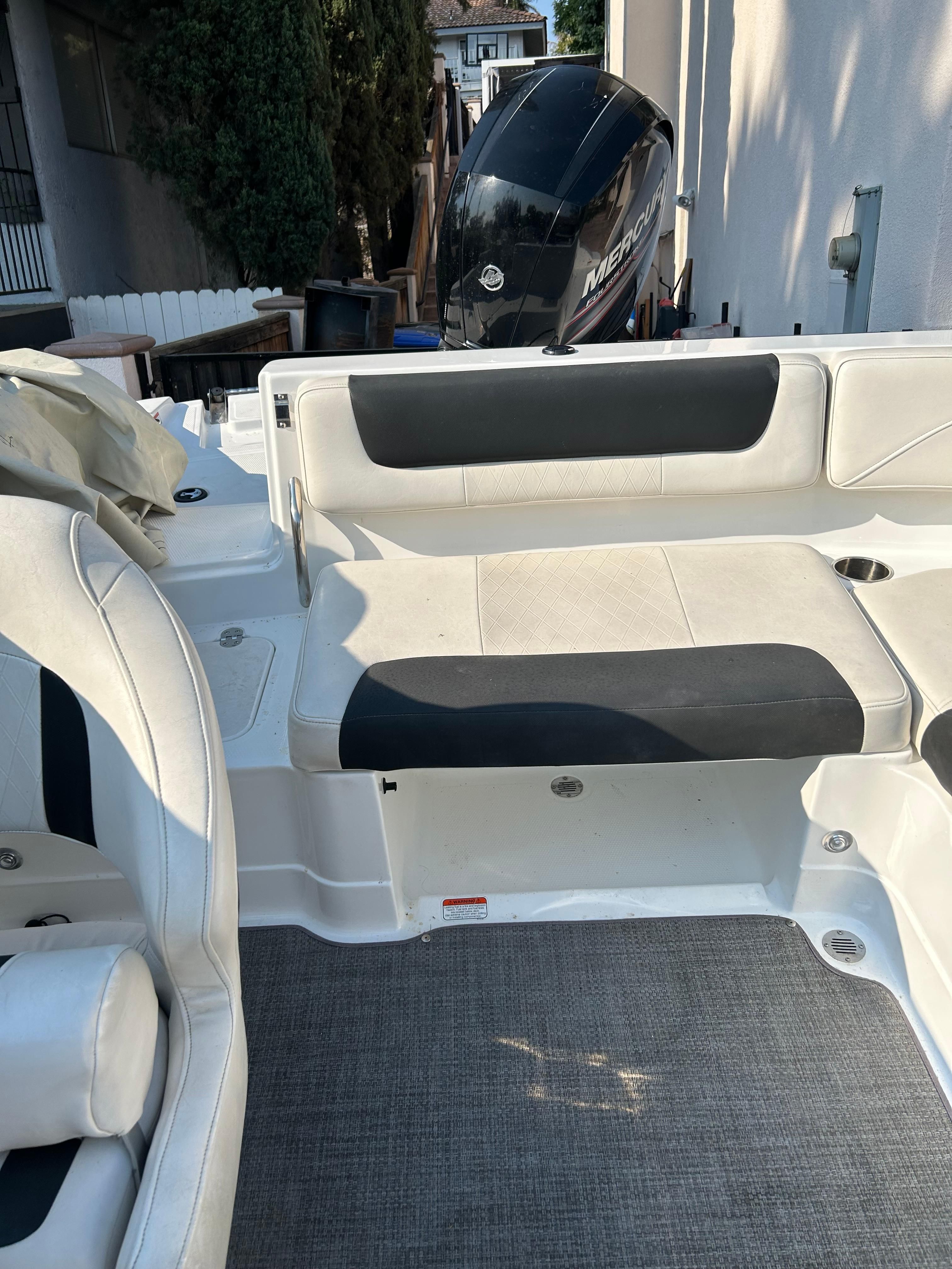 The image shows the interior of a 2017 Tracker TAHOE 2150 boat with seating.