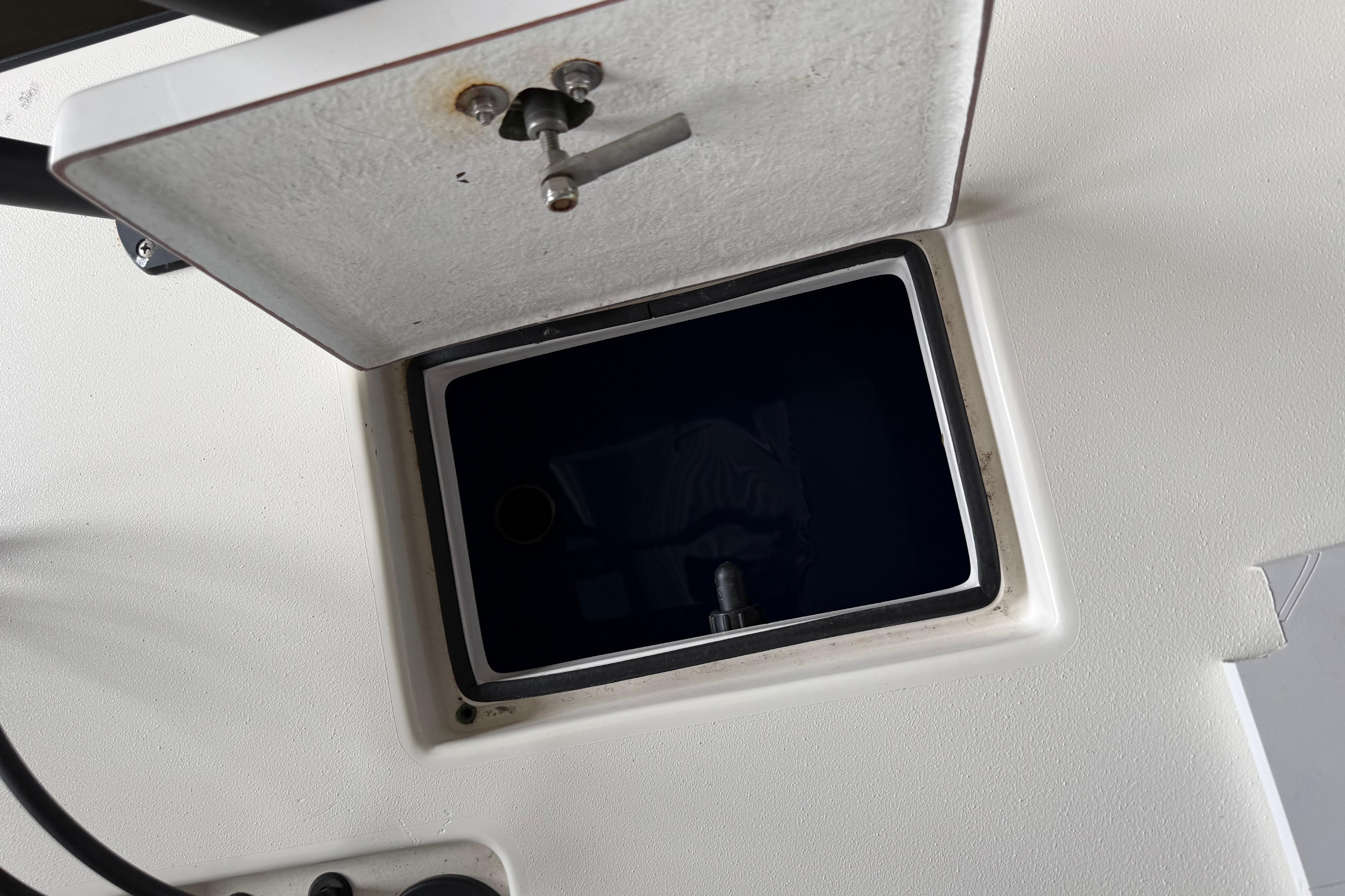 Open storage compartment on a 2020 Skimmer Skiff 14 boat.