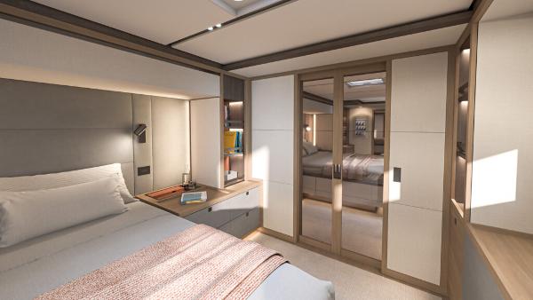 Luxurious bedroom interior of 2025 Lagoon 83 yacht, featuring modern design and cozy ambiance.
