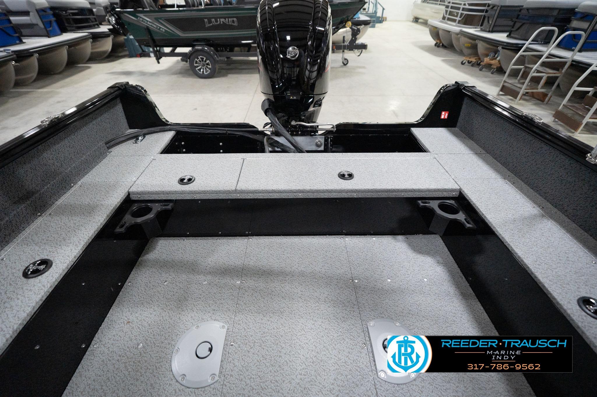 2026 Lund 1800 Explorer Sport boat interior with motor, showcased at Reeder-Trausch Marine.