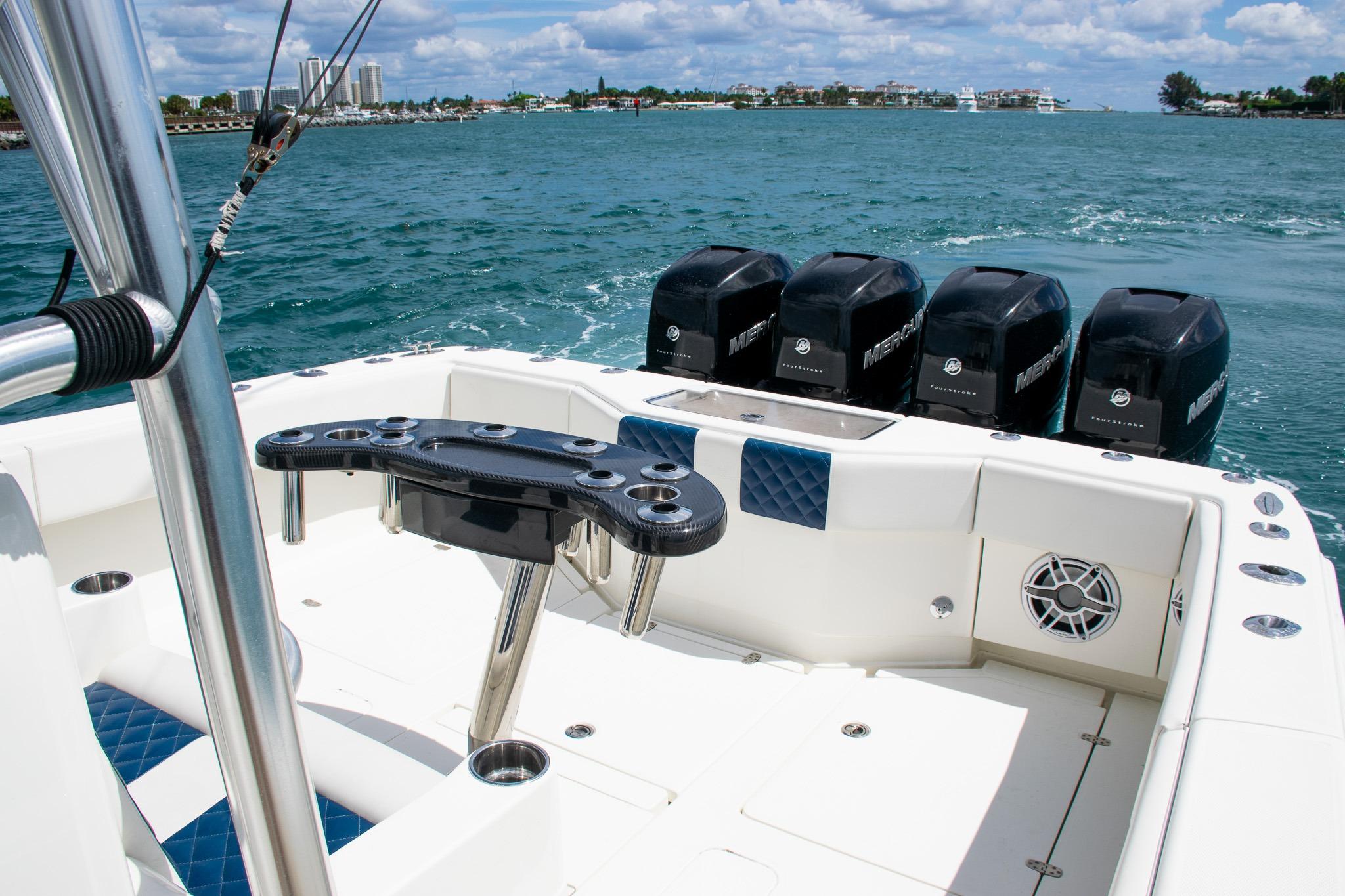 2022 SeaVee 390Z boat with multiple outboard engines on open water.