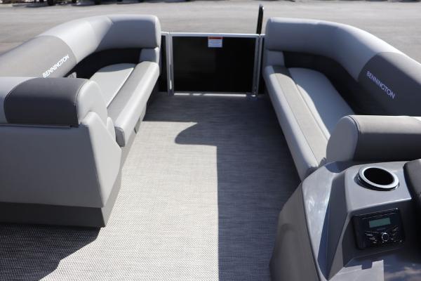 2024 Bennington 20 SL pontoon boat interior with gray seating and console.
