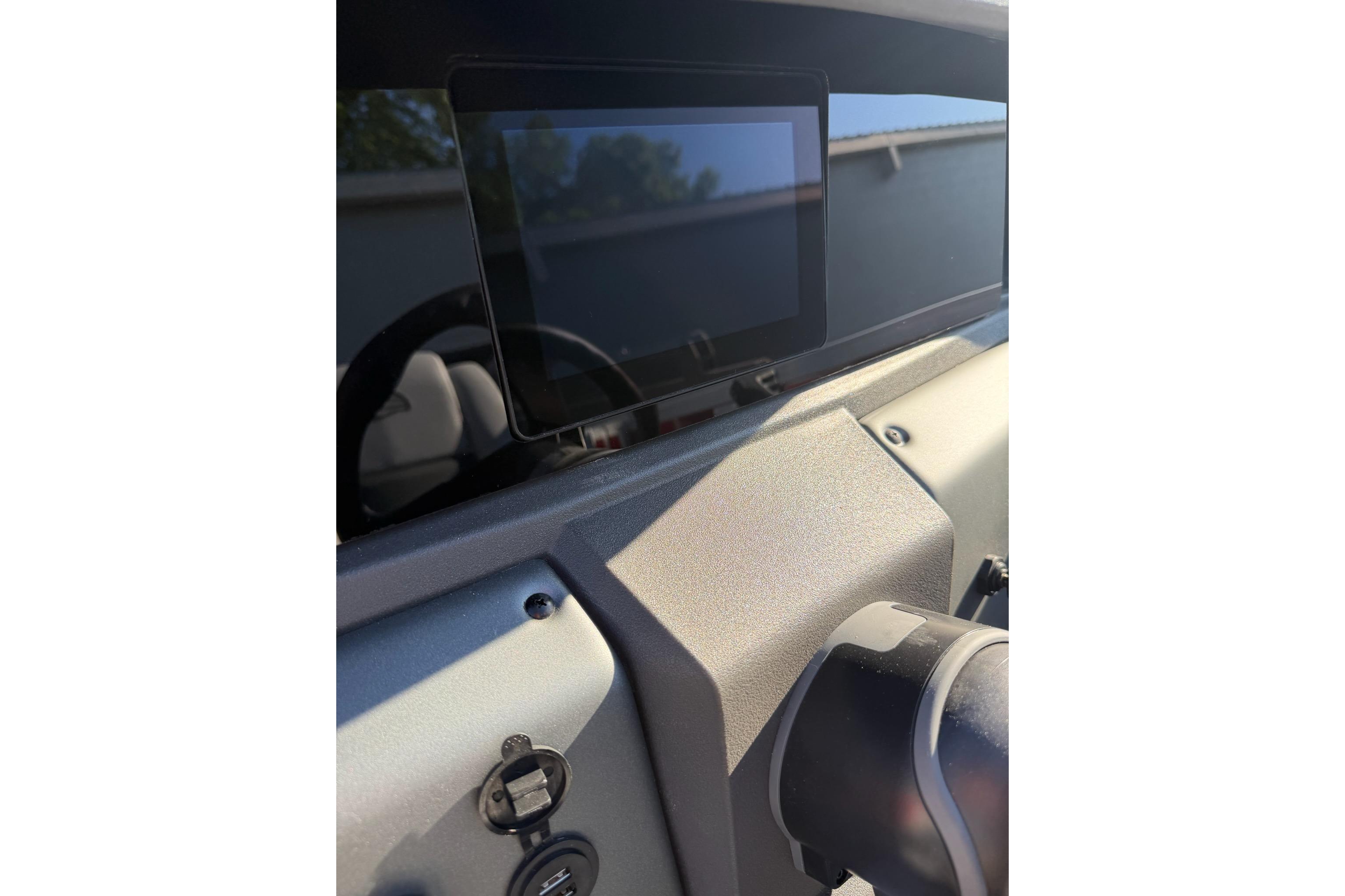 Dashboard of 2026 Sun Tracker Party Barge 18 DLX with digital display.