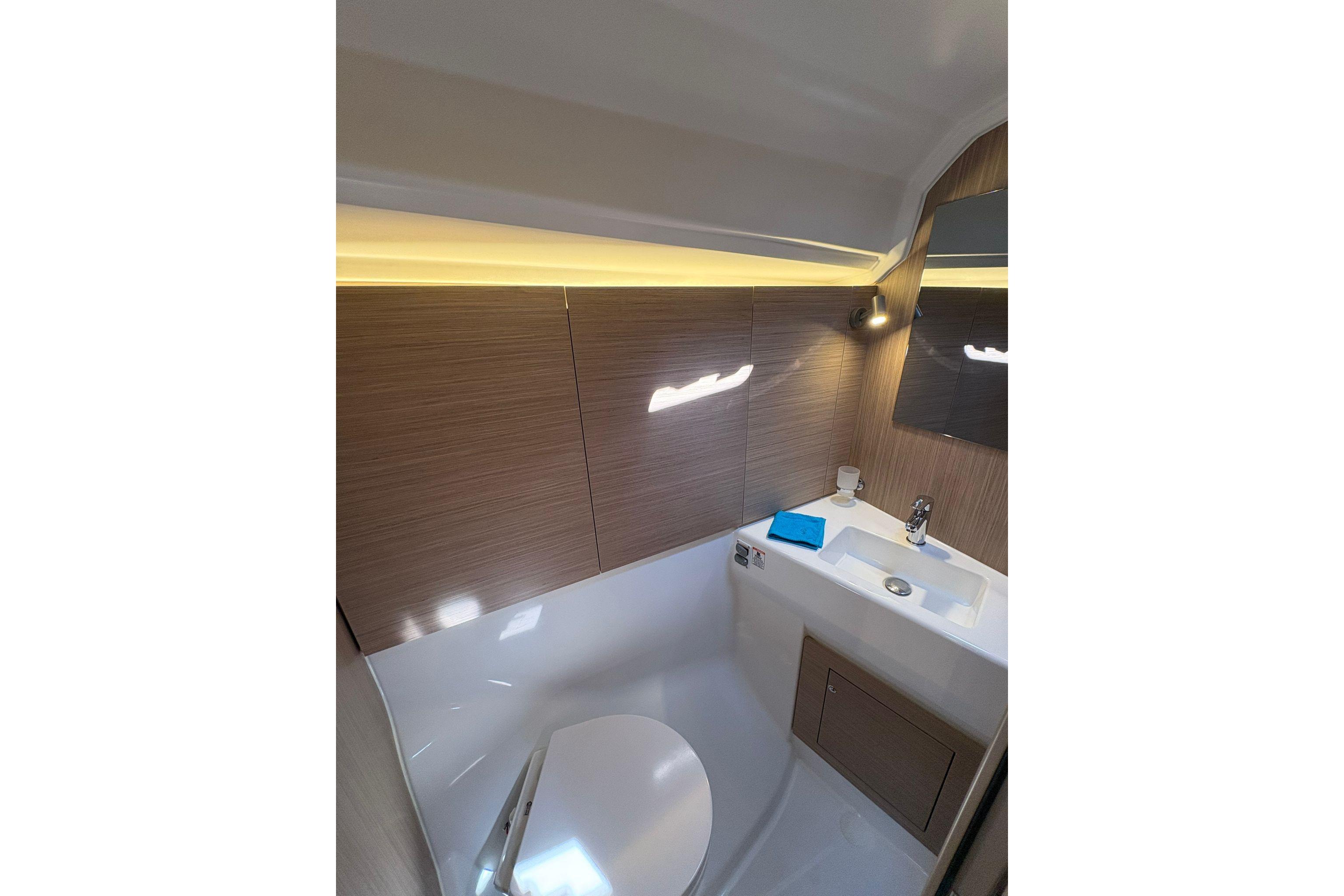 Modern bathroom interior of 2026 Beneteau Oceanis 40.1 yacht with sleek design.