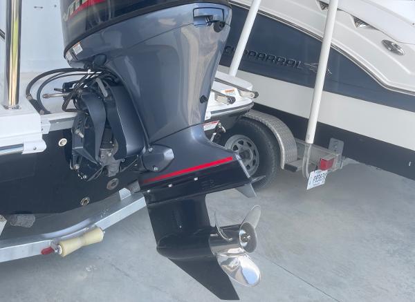 2022 Hurricane SS185 OB outboard motor and propeller on a boat trailer.