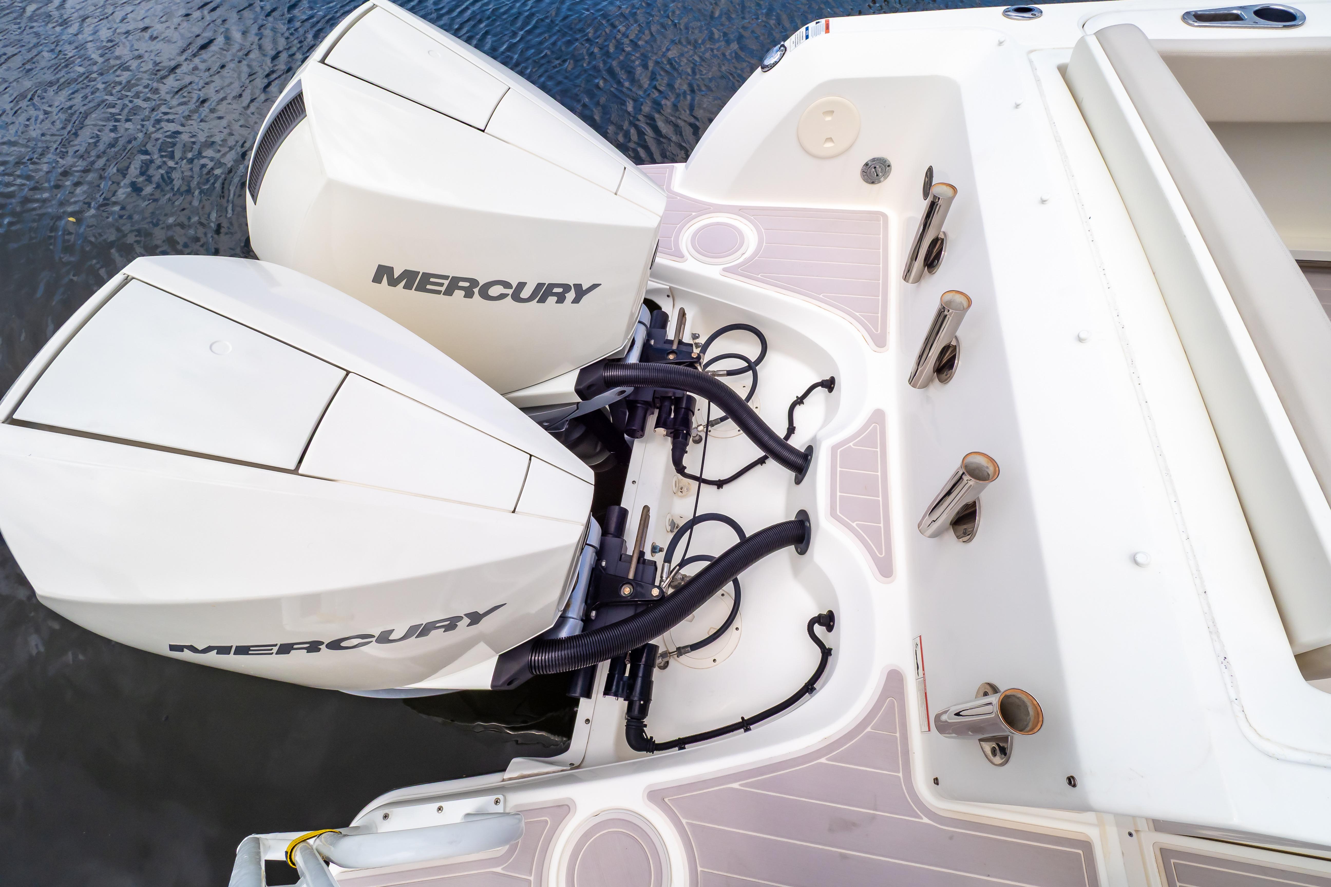 2019 Boston Whaler 270 Vantage with dual Mercury outboard engines on water.