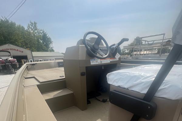 2025 G3 Gator Tough 18 CCJ boat interior with steering wheel and seating.