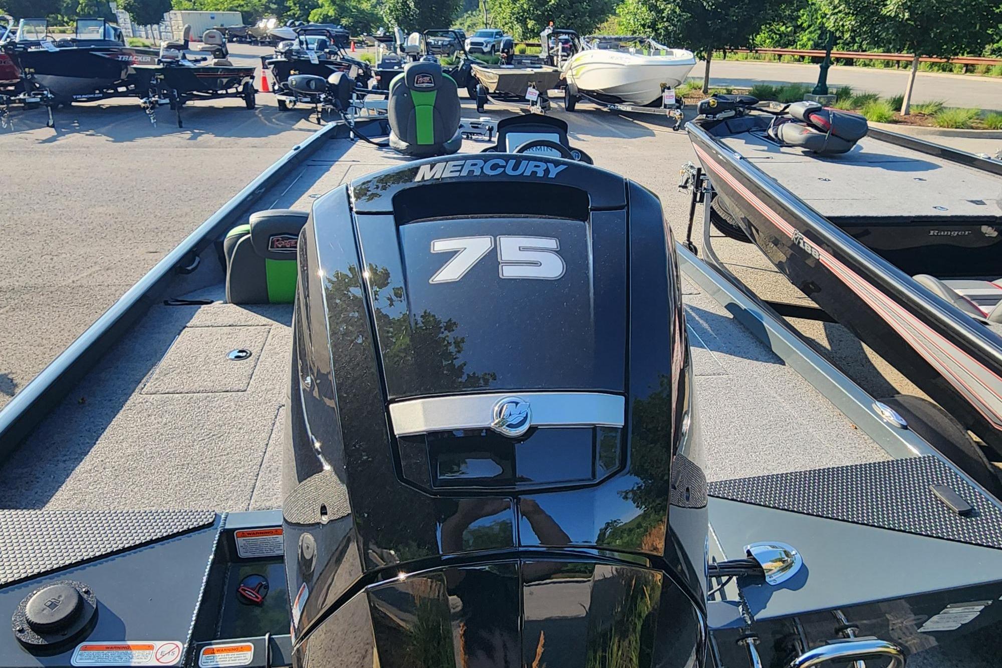 2026 Ranger RT178 boat with Mercury 75 engine in a parking lot.