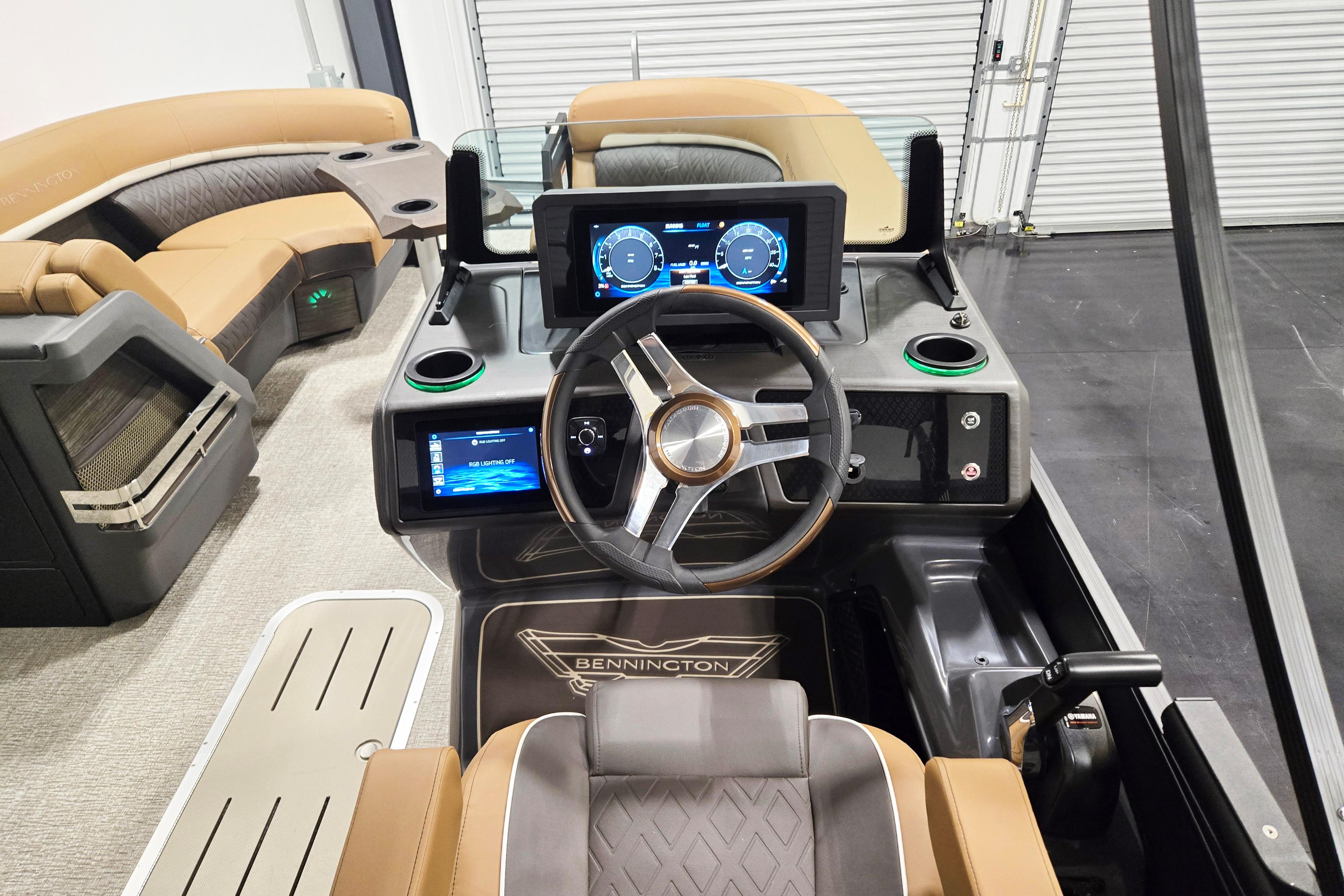 Interior of 2026 Bennington 22 M Swingback boat with modern dashboard and seating.