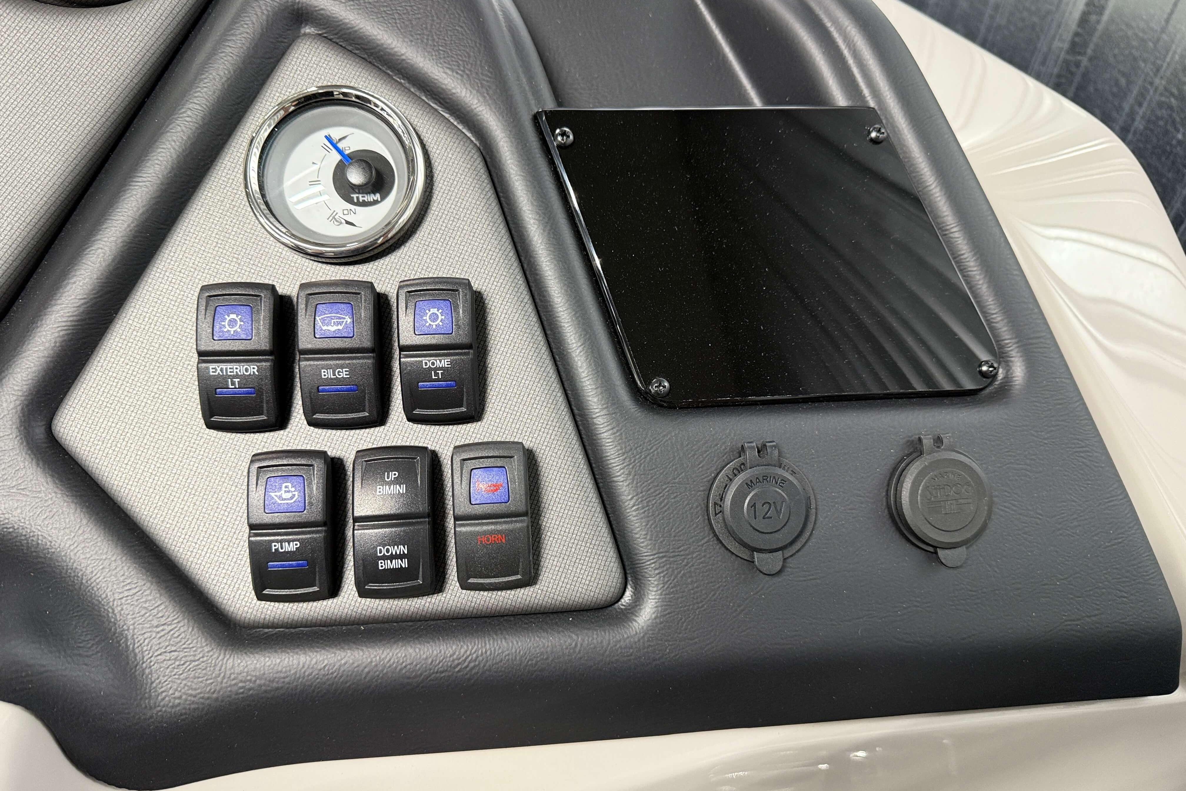 Control panel of 2026 Sylvan L3 SLZ boat with switches and gauges.
