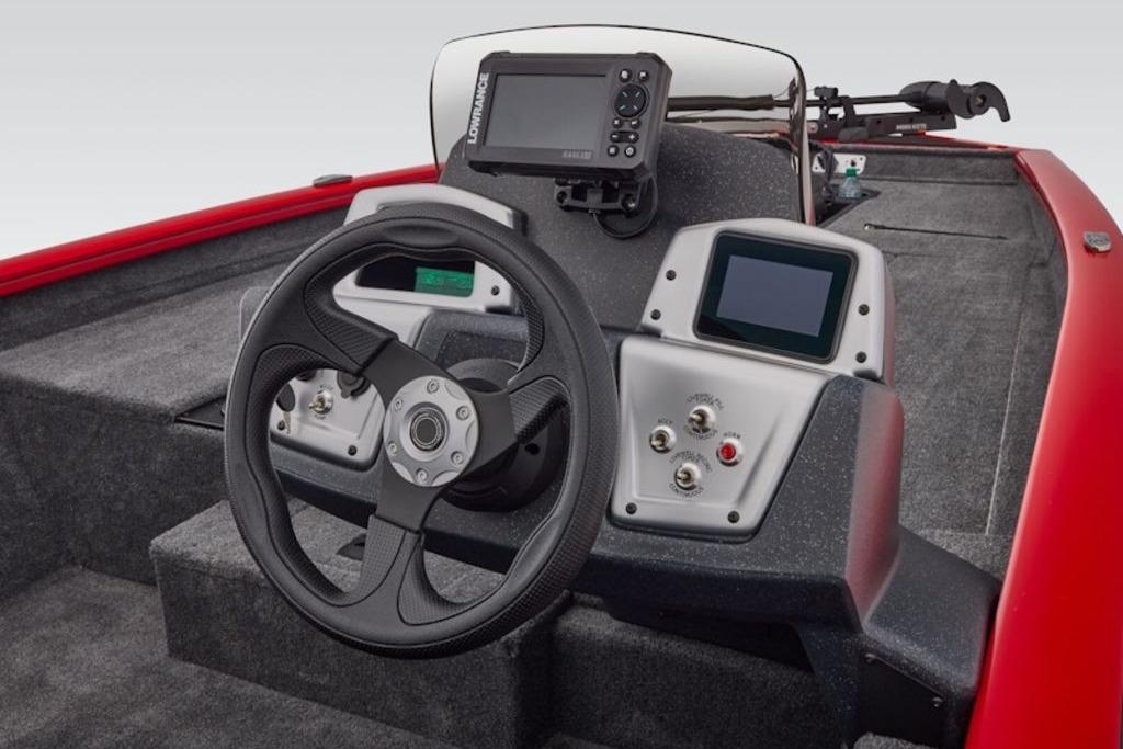 2026 Tracker Pro Team 190 boat dashboard with steering wheel and electronic displays.