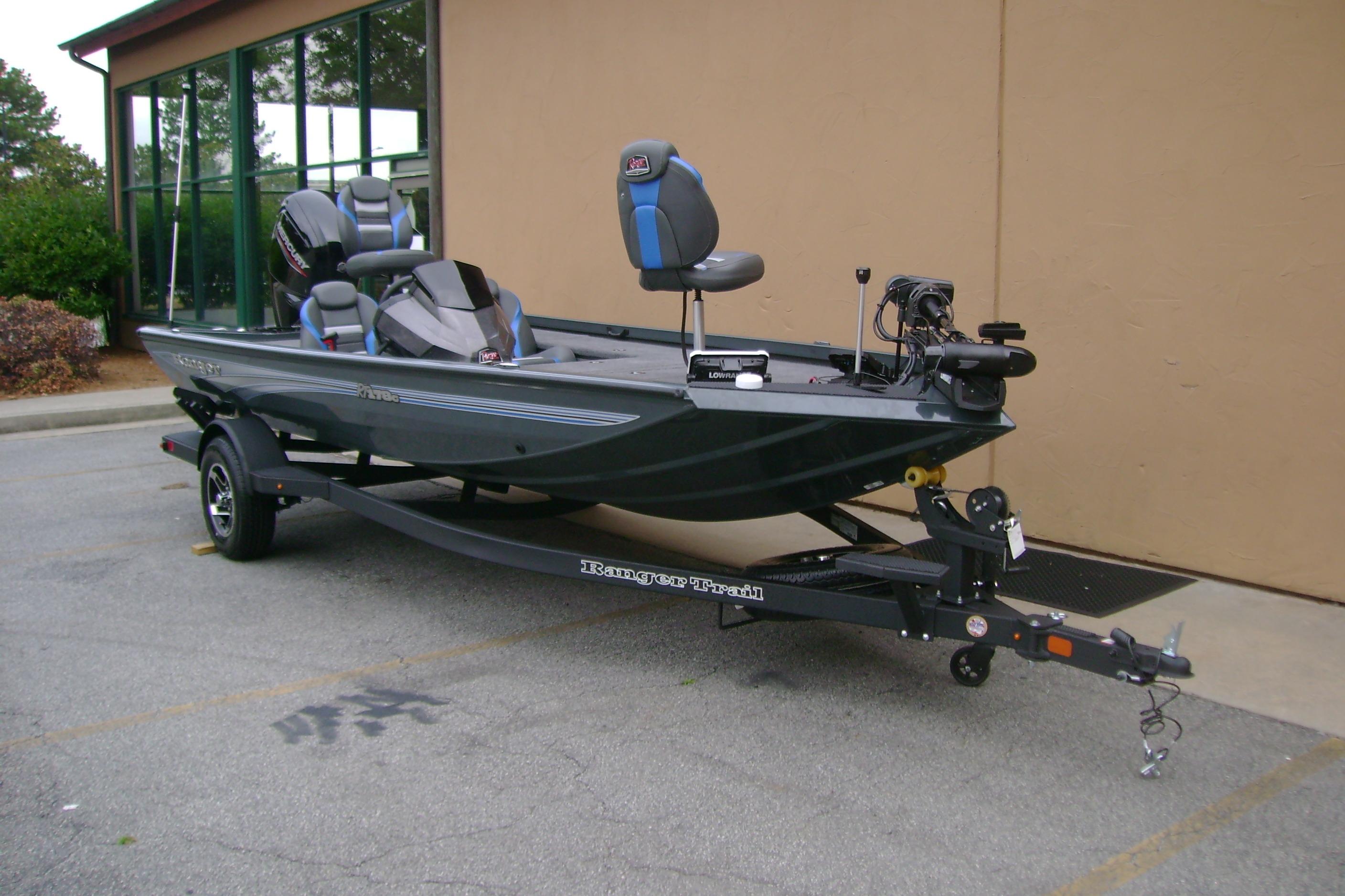 2026 Ranger RT178C fishing boat on trailer, parked outdoors.