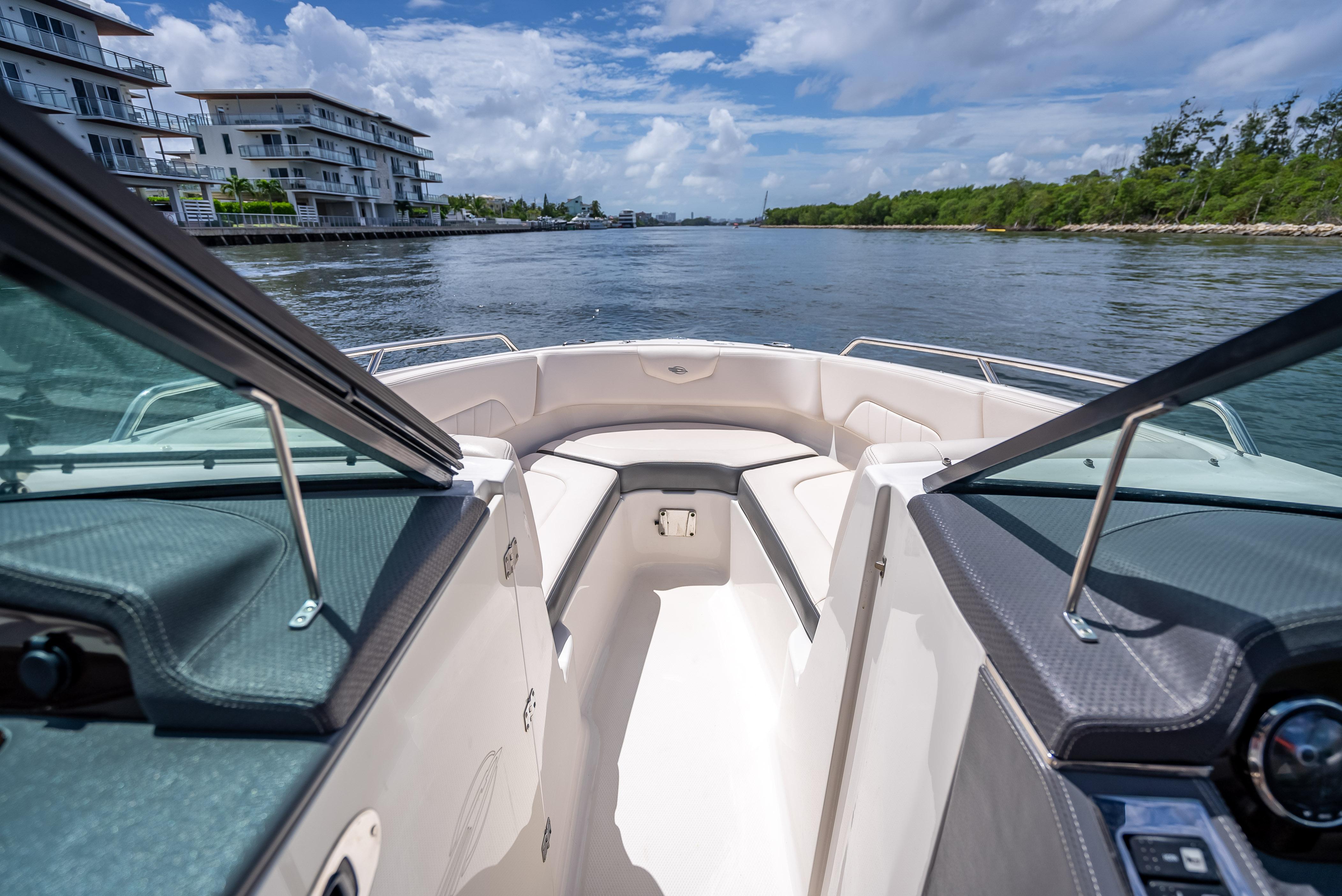 2017 Chaparral 227 SSX boat interior with scenic waterfront view.