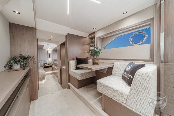 Luxurious interior of 2025 Sunseeker Manhattan 68 yacht with elegant seating and decor.