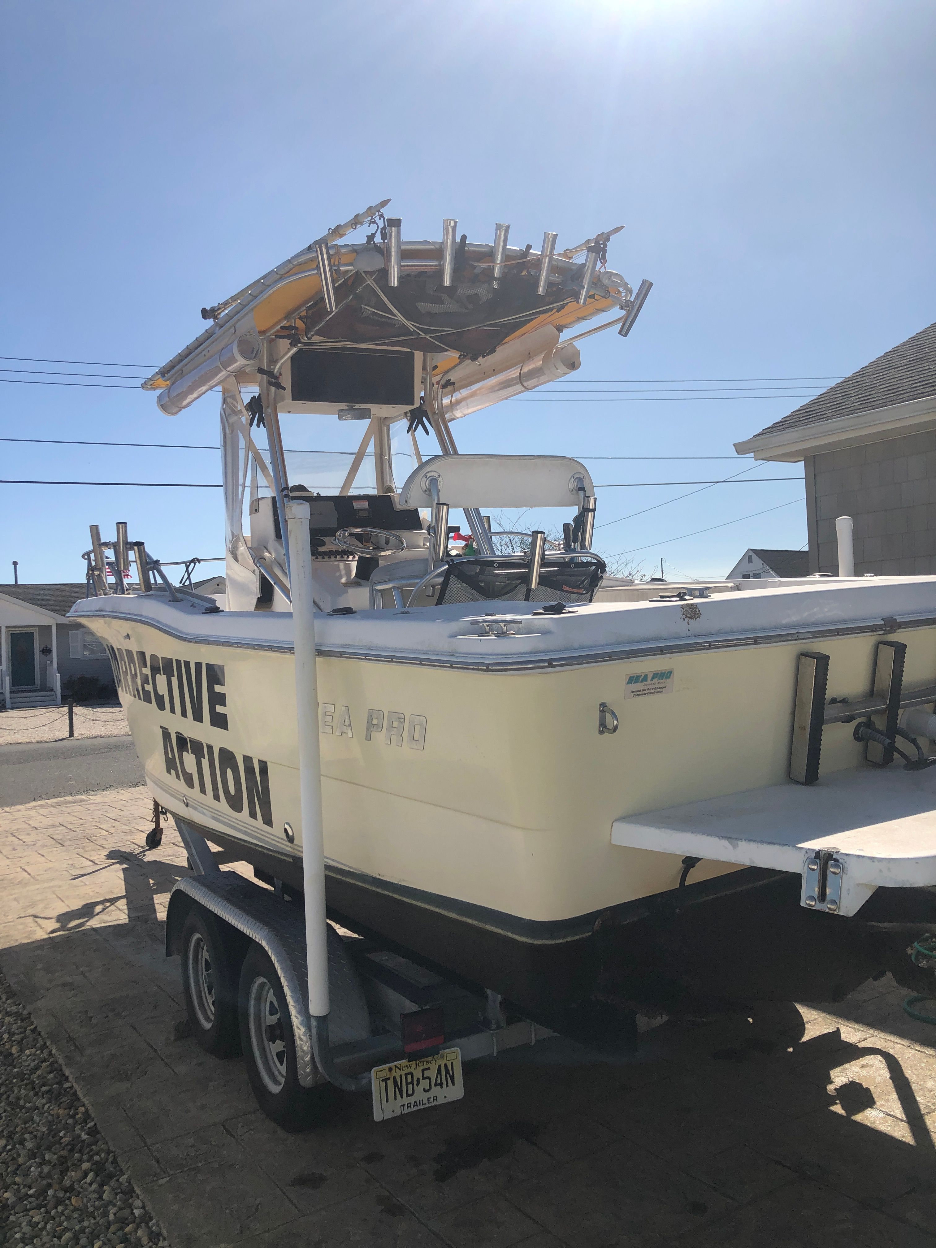 2003 Sea Pro 235 Center Console boat on trailer.