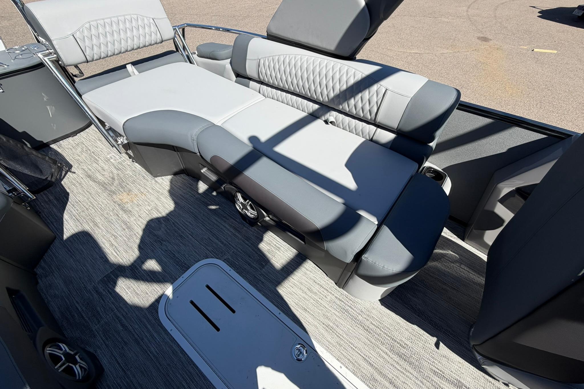 2026 Avalon Excalibur LTD Quad Lounge interior with luxurious gray seating and modern design.
