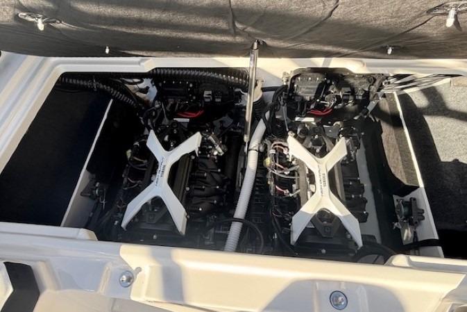 2026 Yamaha Boats 222S engine compartment with dual engines, showcasing advanced marine technology.