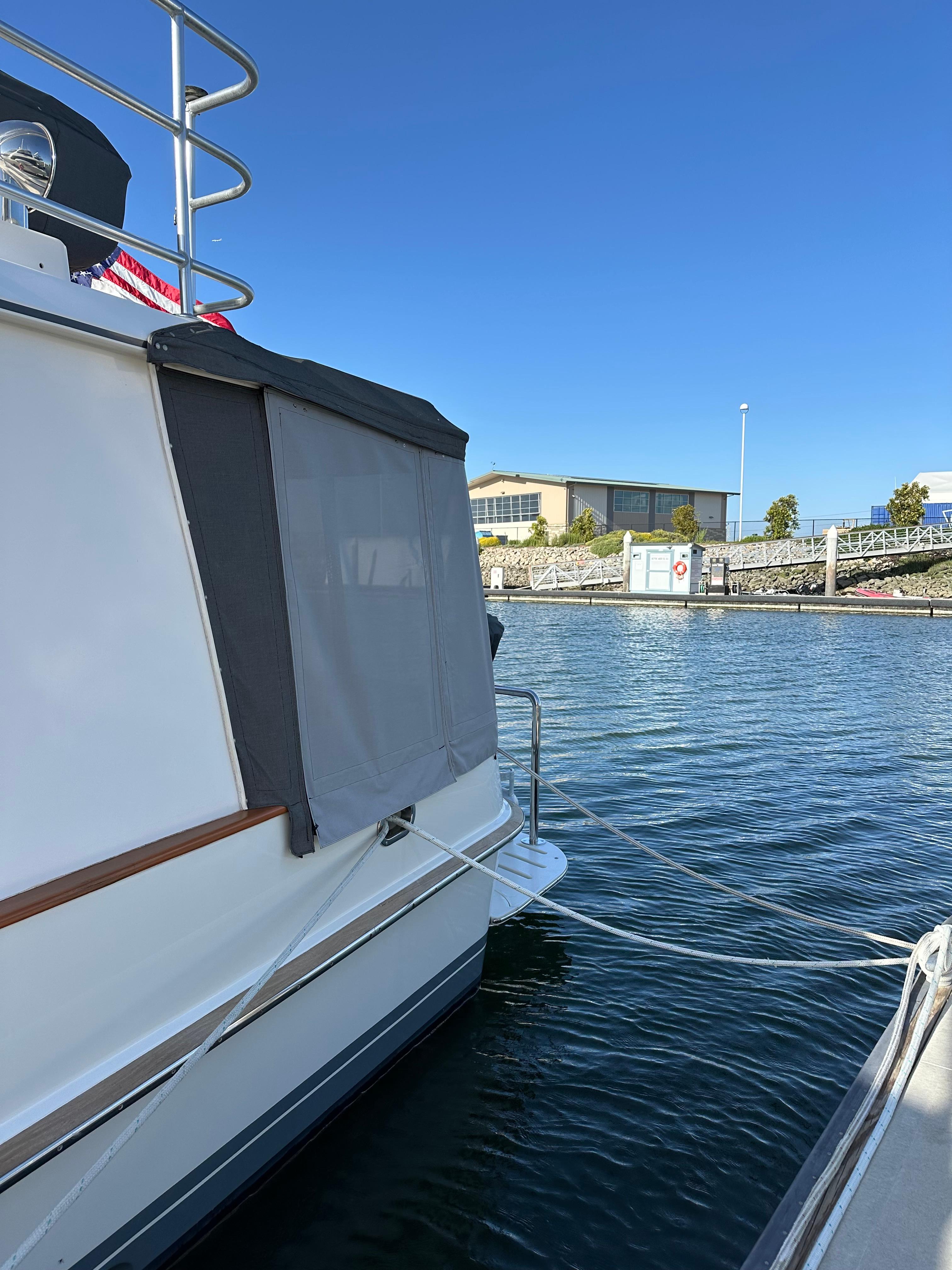 1999 Cherubini Independence 50 yacht docked at marina.