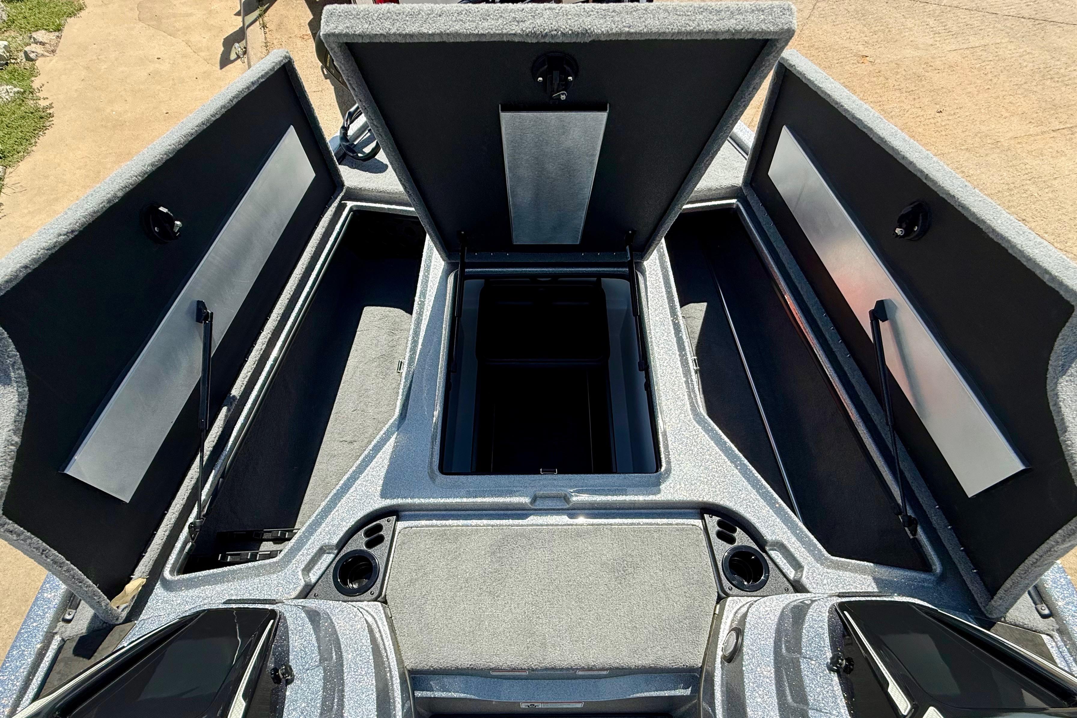 Open storage compartments on a 2026 Nitro Z19 XL boat.