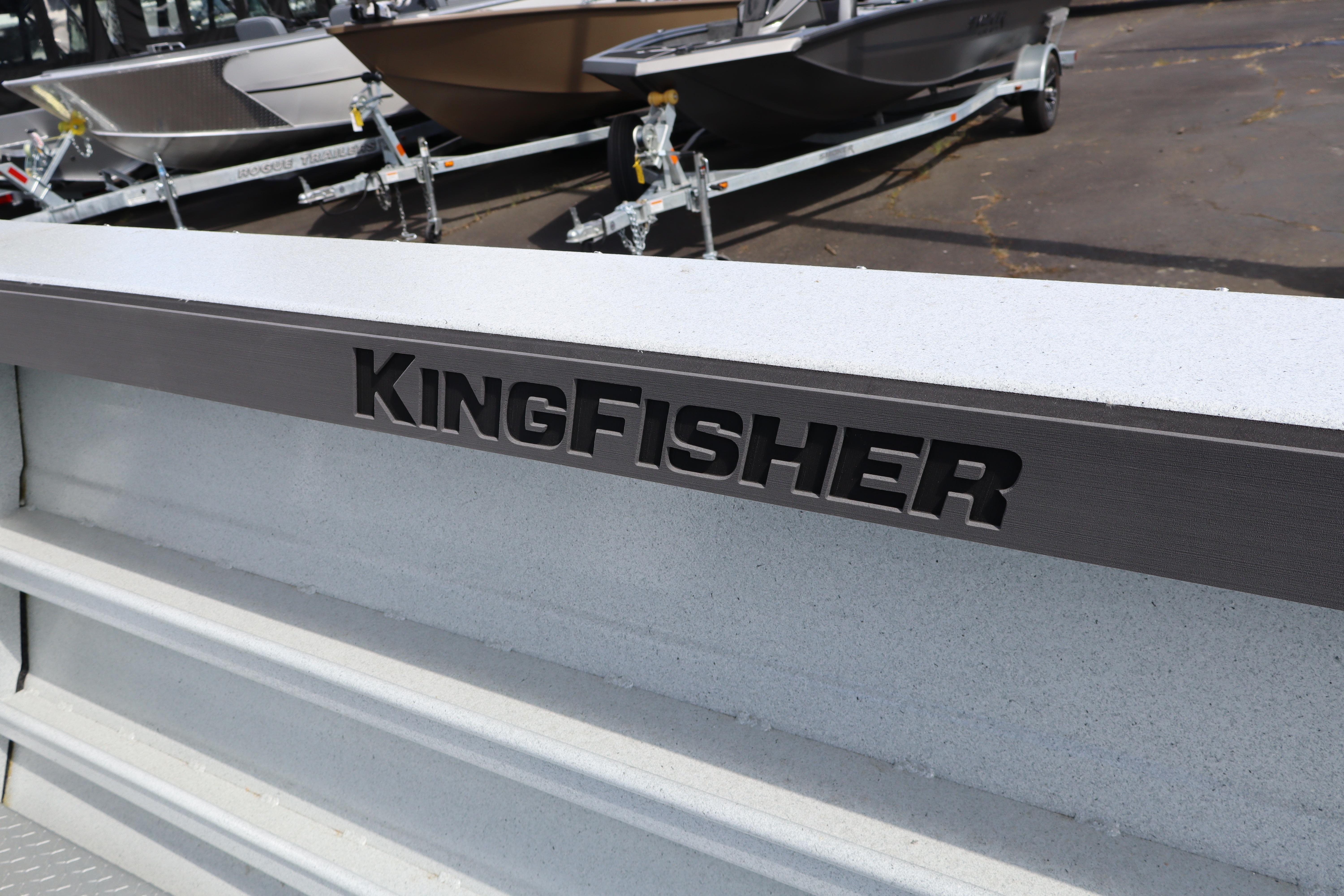 2026 KingFisher 2425 Escape HT boat detail with logo, parked on trailer.