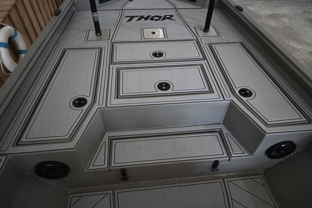 2026 Thor Lake Hammer 1900CC boat deck with sleek design and storage compartments.