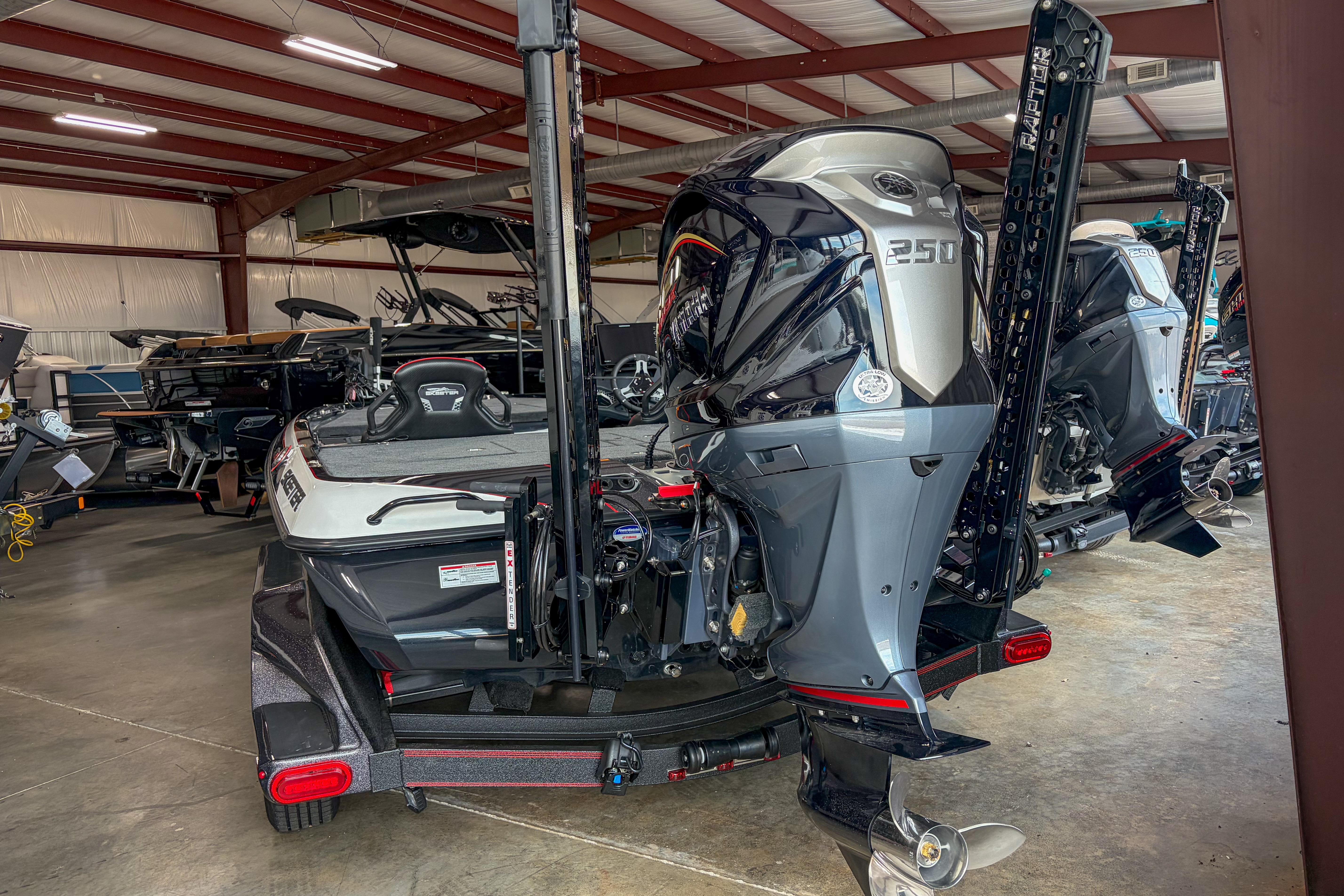 2026 Skeeter FXR20 FLEX boat with powerful 350 engine in showroom.