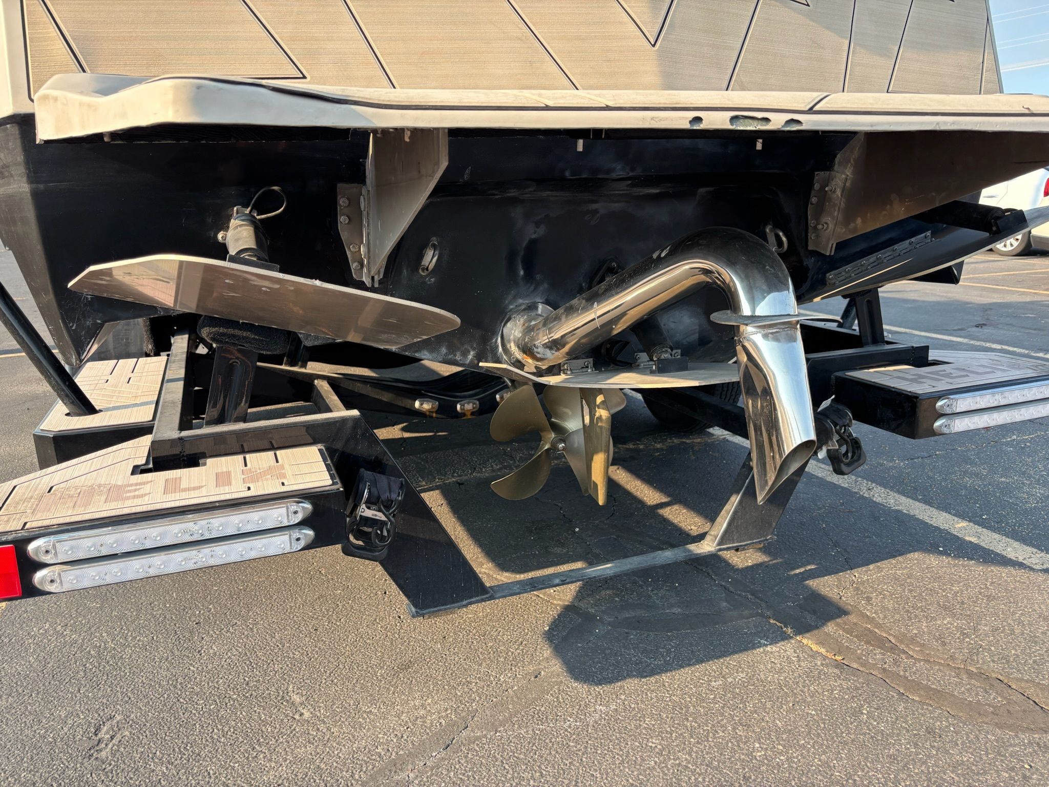 Rear view of a Custom DSB25 boat with propeller, year 2025.