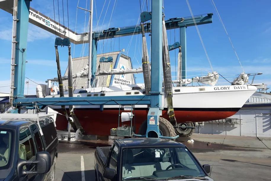 1977 Morgan Out Island 51 sailboat "Glory Days" in a boatyard lift.