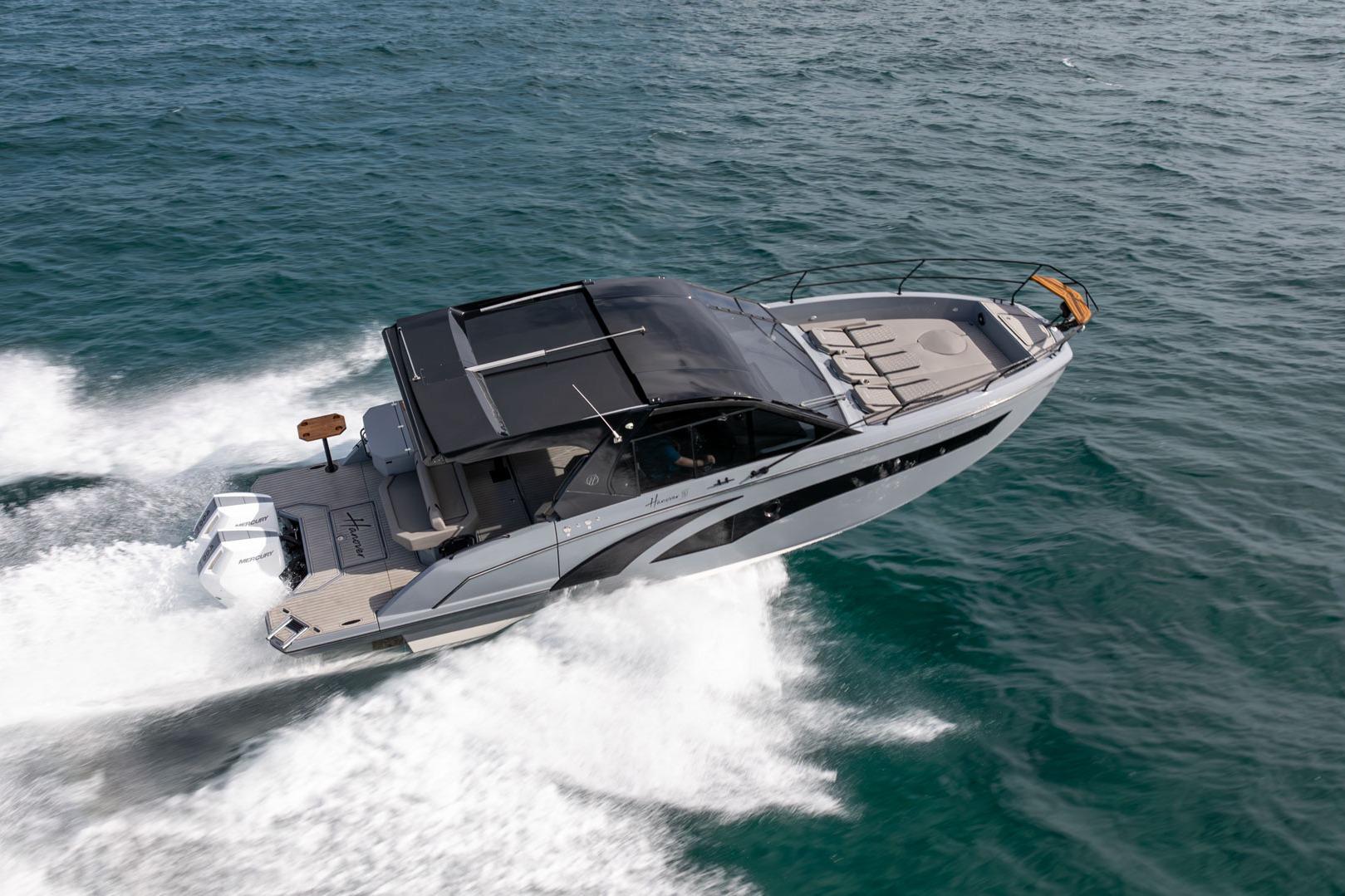 2026 Hanover 387 boat cruising swiftly on open water.