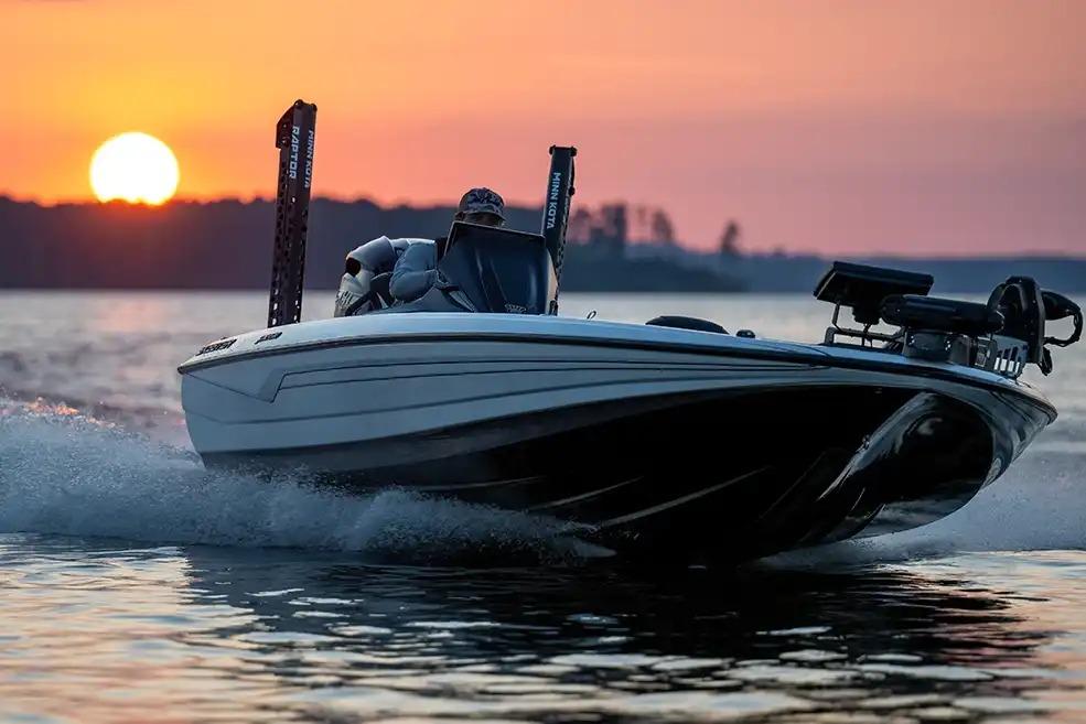 Manufacturer Provided Image: 2026 Skeeter FXR20 FLEX boat cruising at sunset on a serene lake.