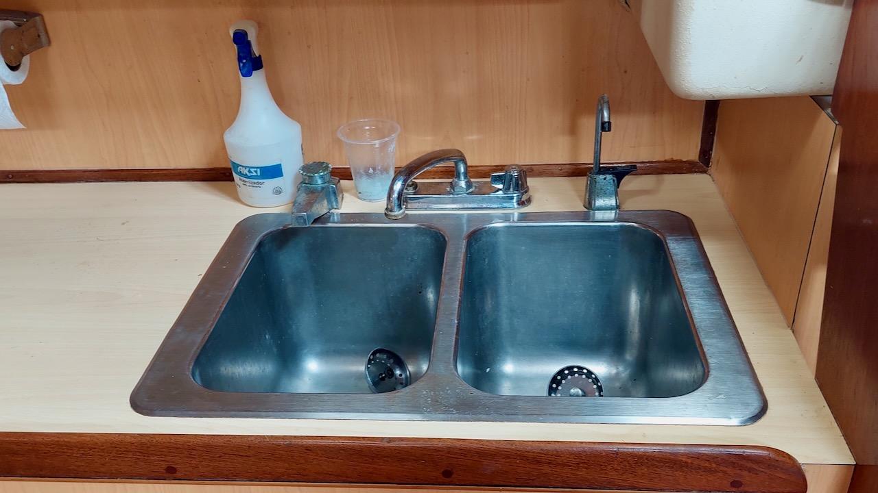 Double sink in 1981 Morgan Out Island 41 yacht kitchen area.