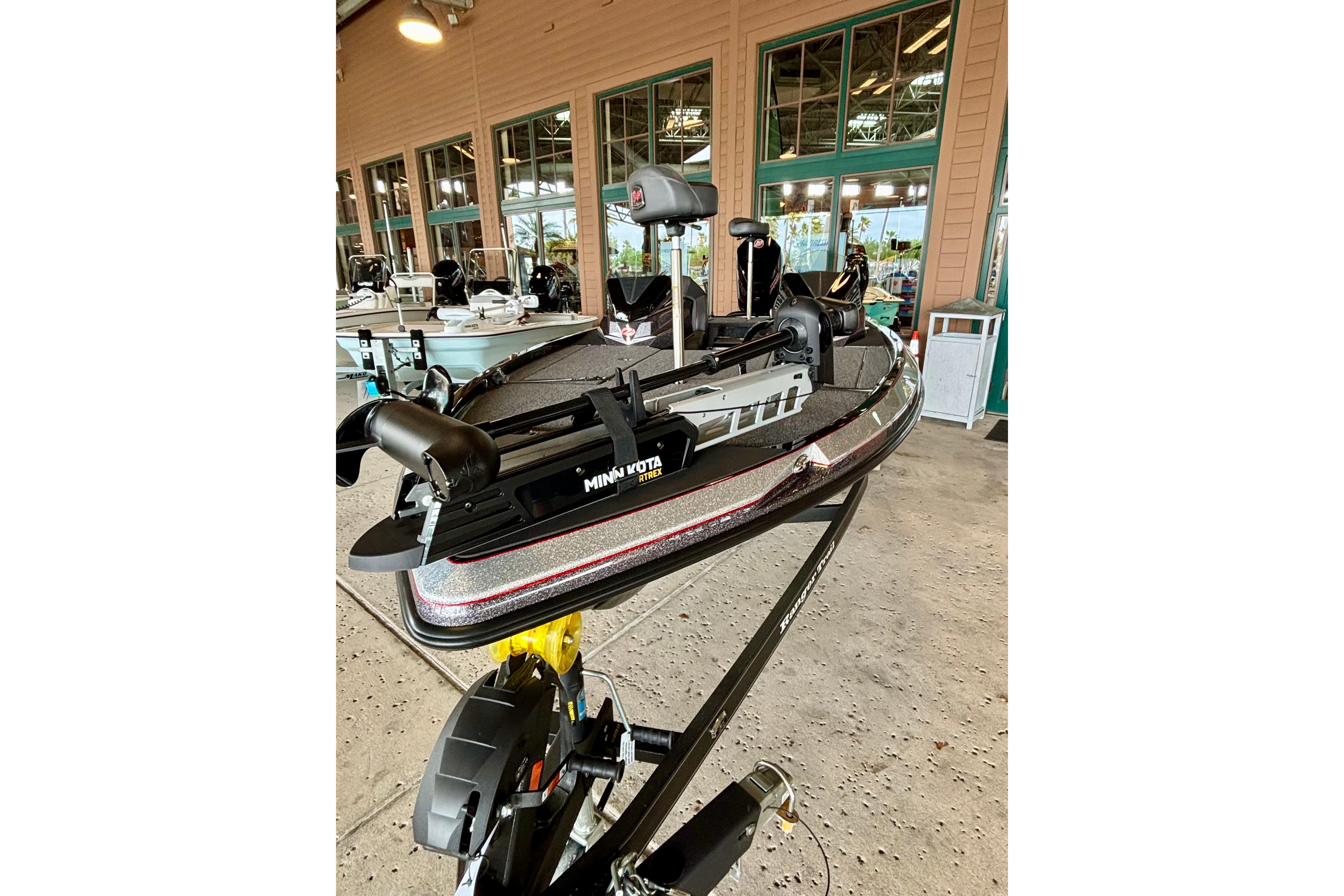 2025 Ranger Z519R boat with Minn Kota trolling motor displayed indoors.