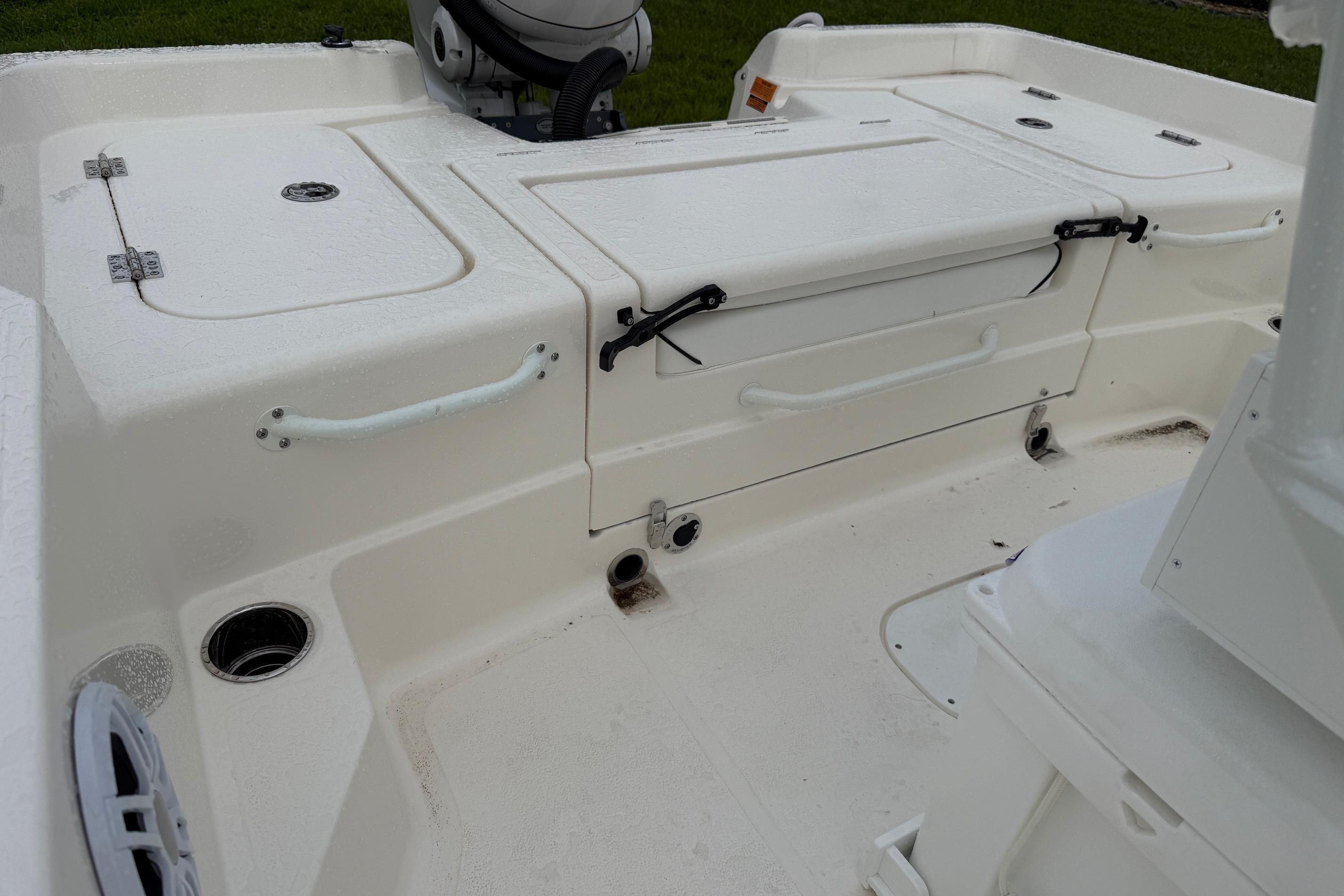 2026 Skeeter SX2350 boat interior with storage compartments and seating area.