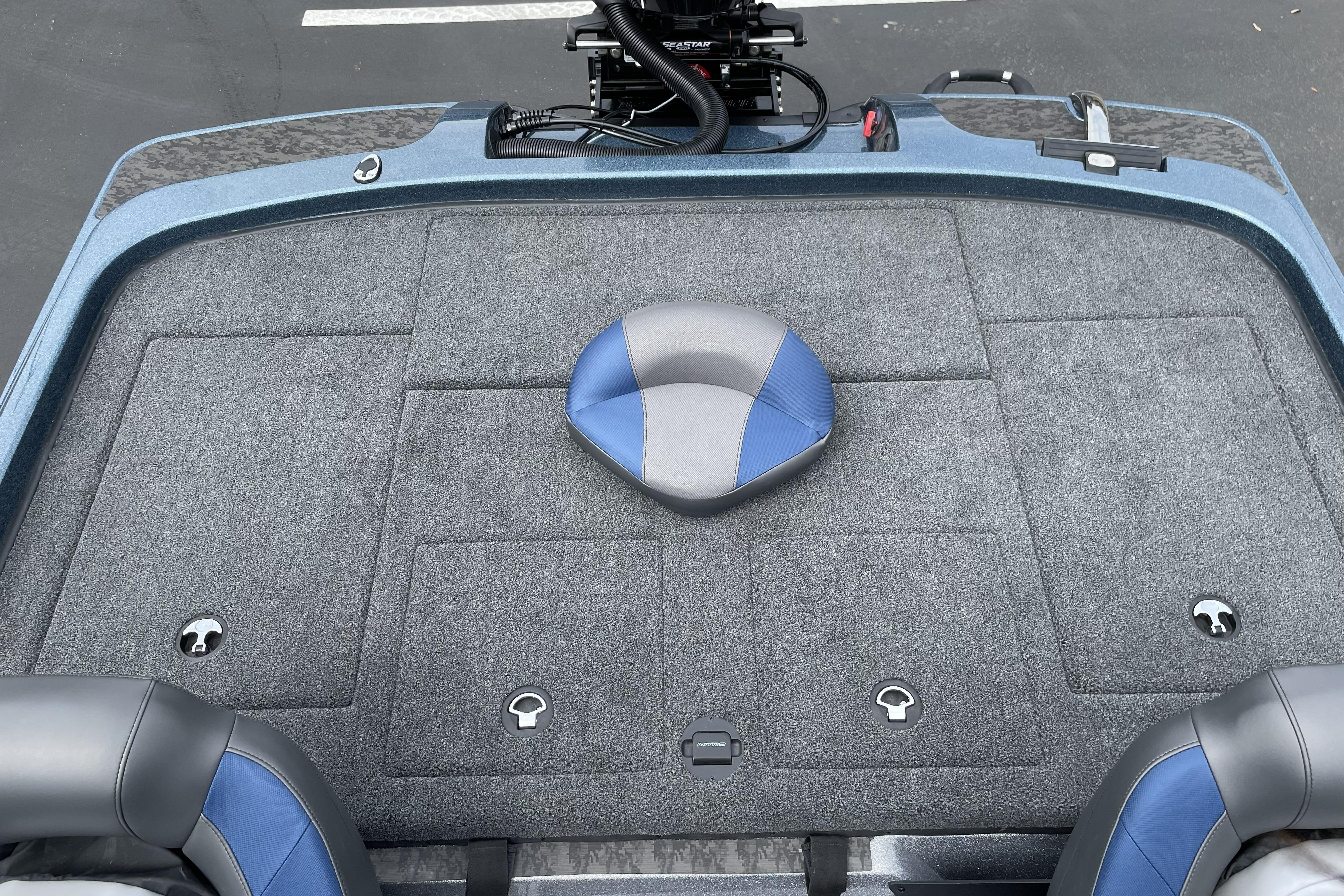 2026 Nitro Z21 XL boat deck with gray carpet and blue-gray seat.